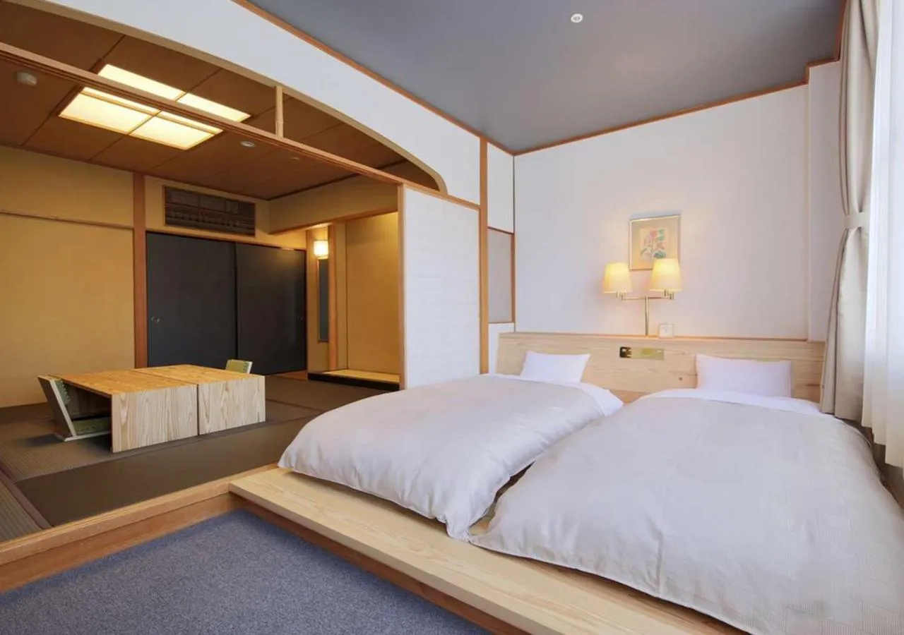 Photo of the whole room, Bed in RYOKAN OQOQ-Tamai Bekkan