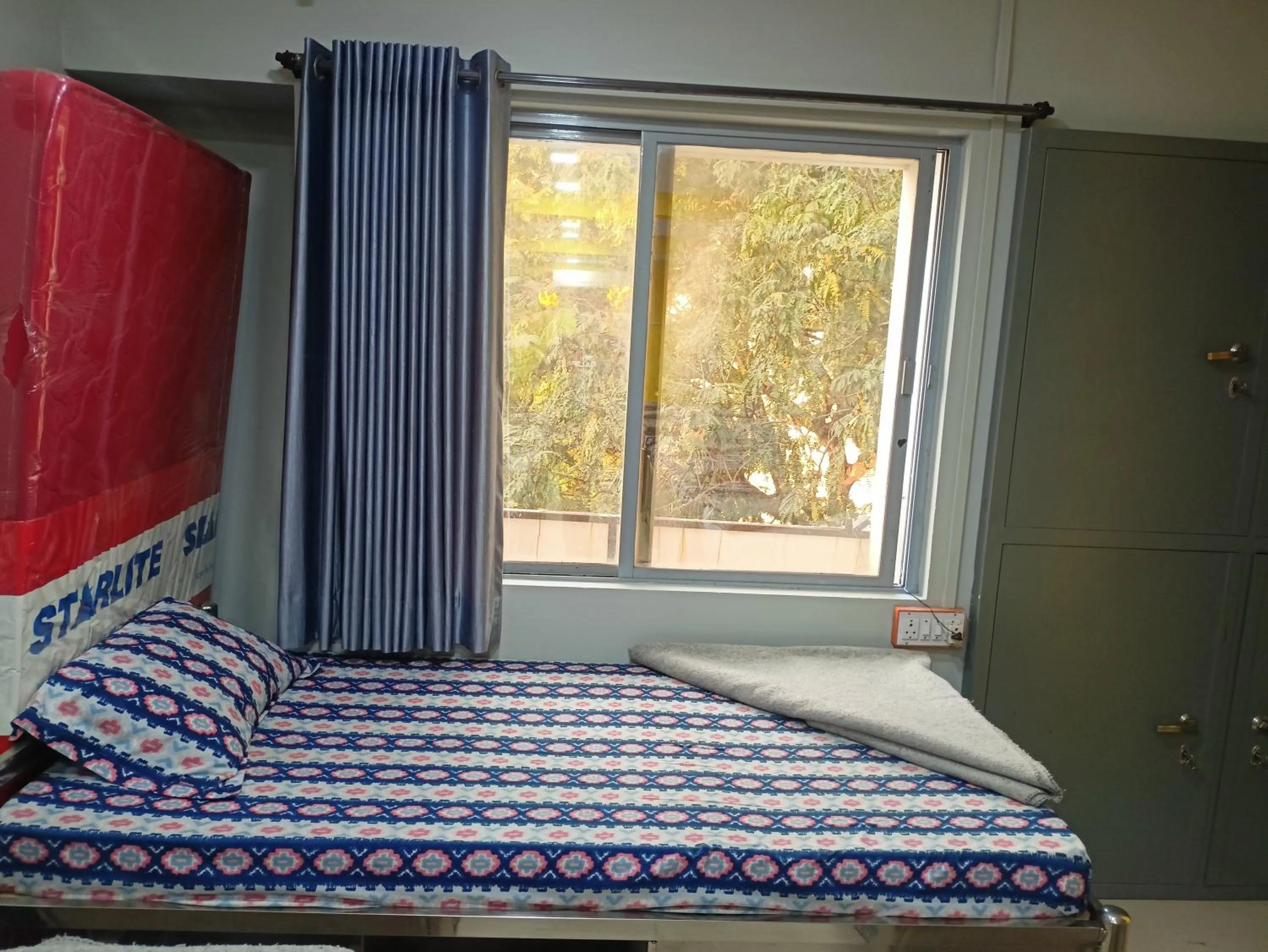 Bed in Shiv Sai Dormitory