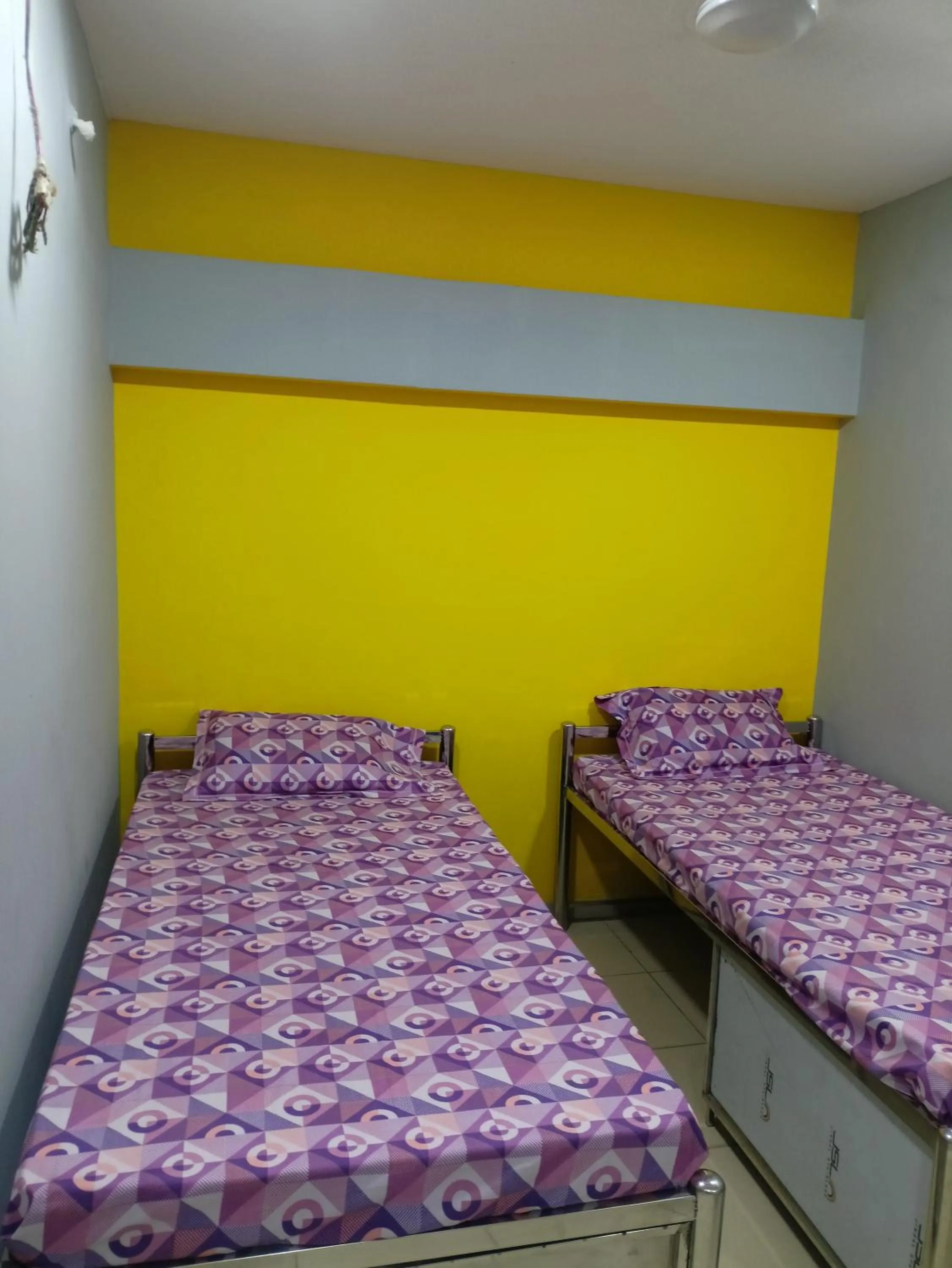 Bed in Shiv Sai Dormitory