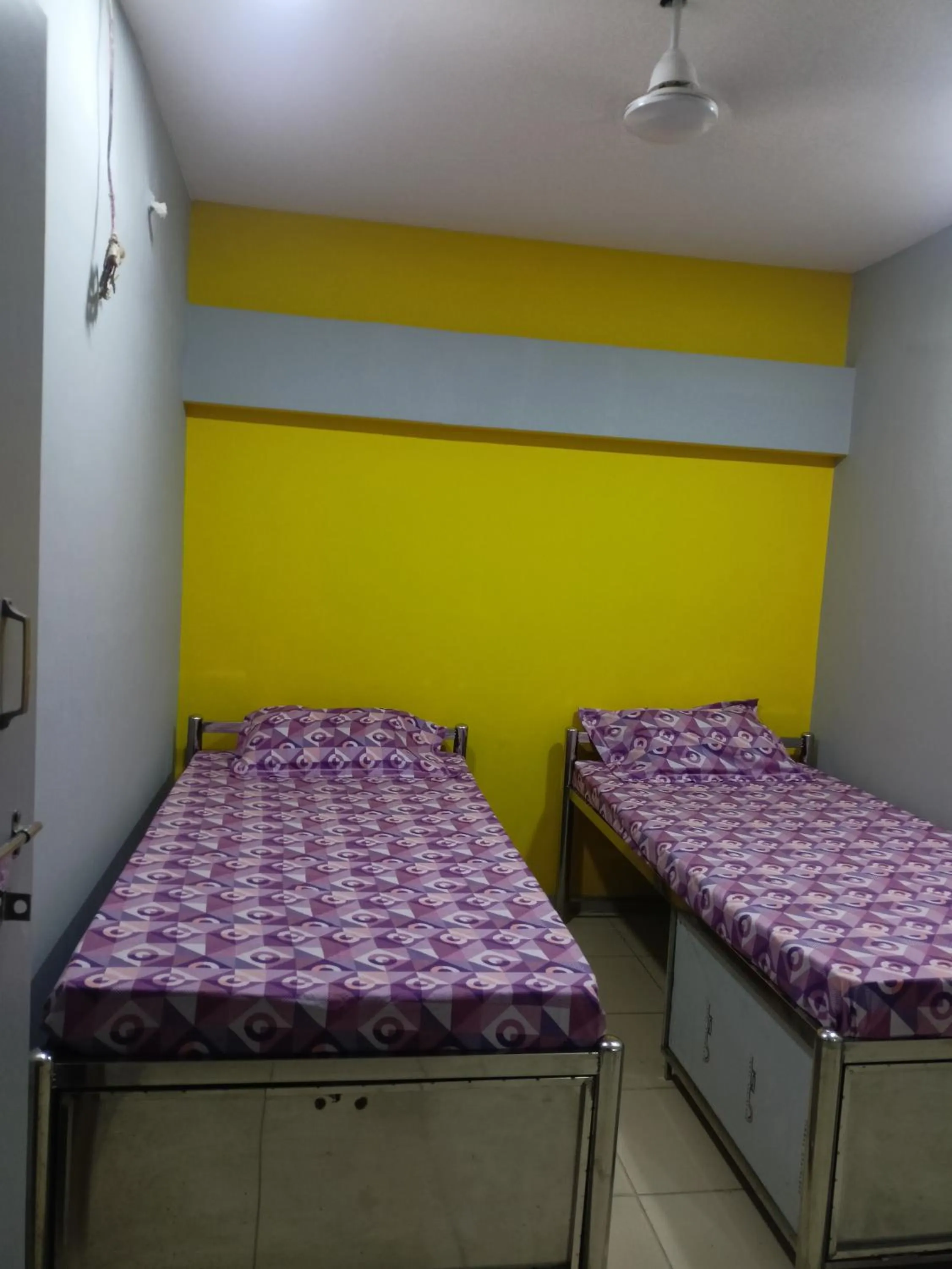 Bed in Shiv Sai Dormitory