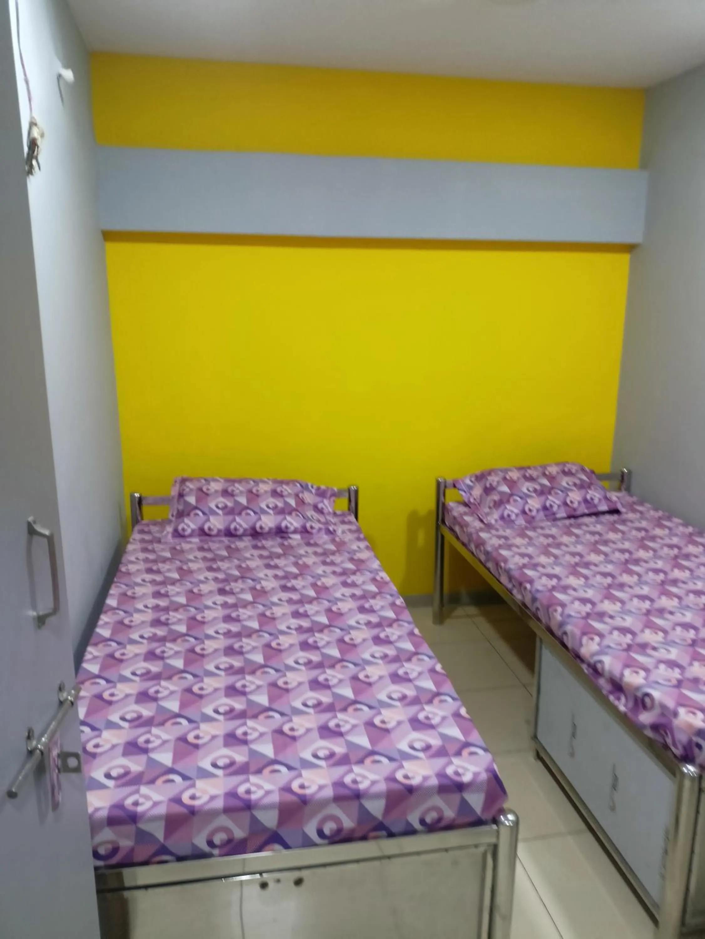 Bed in Shiv Sai Dormitory