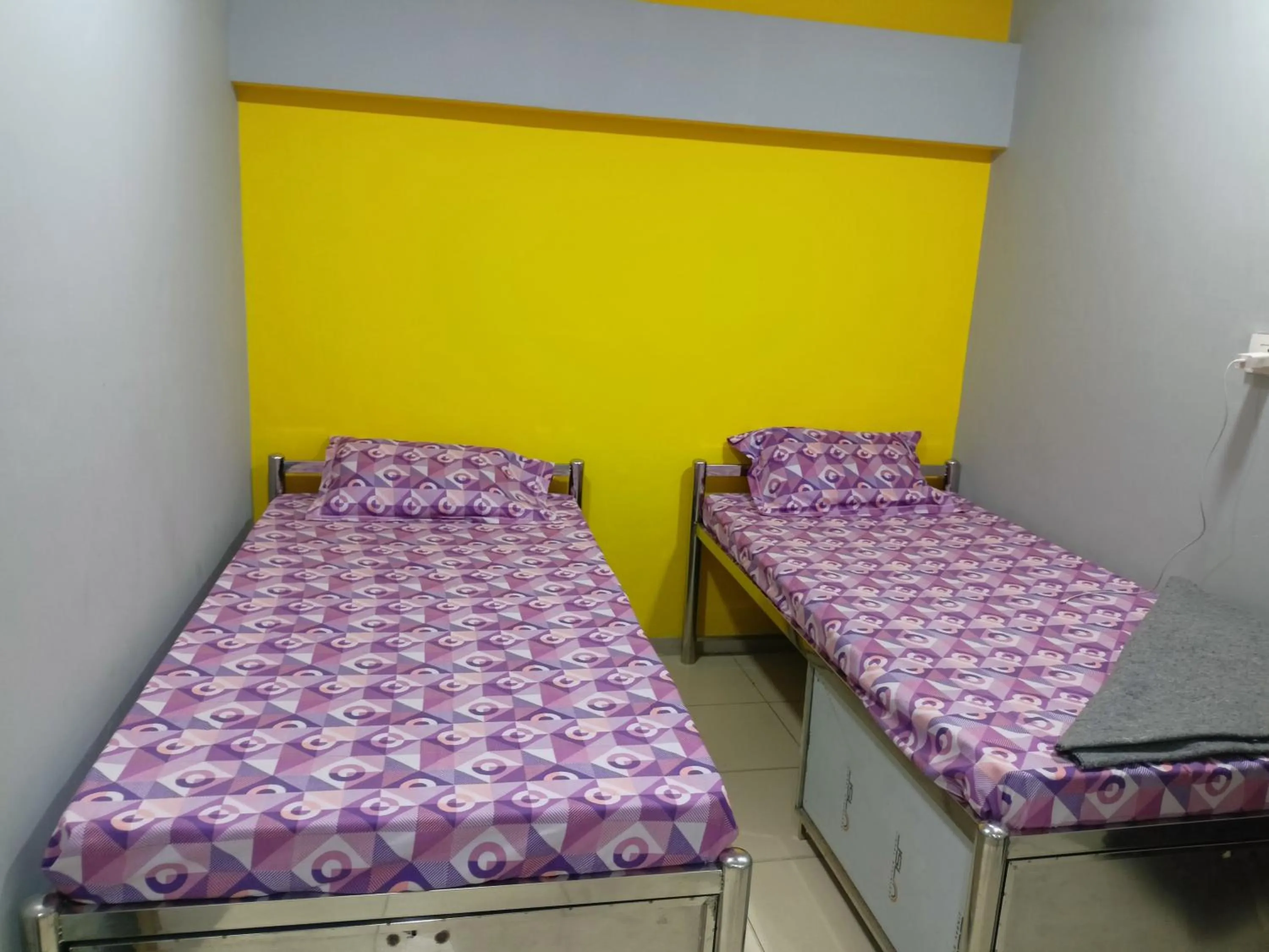 Bed in Shiv Sai Dormitory