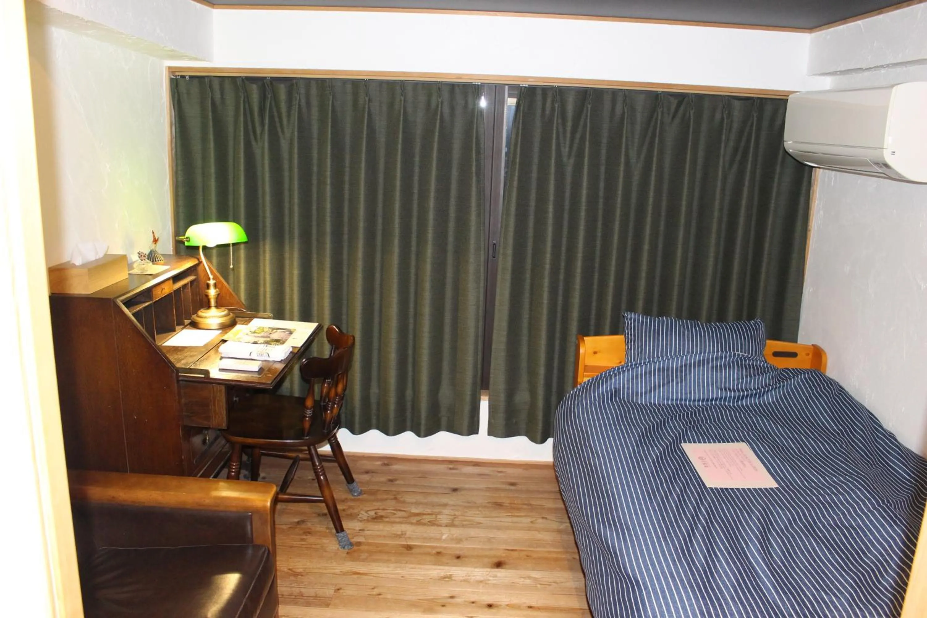 Bed in Guesthouse Izame Ann