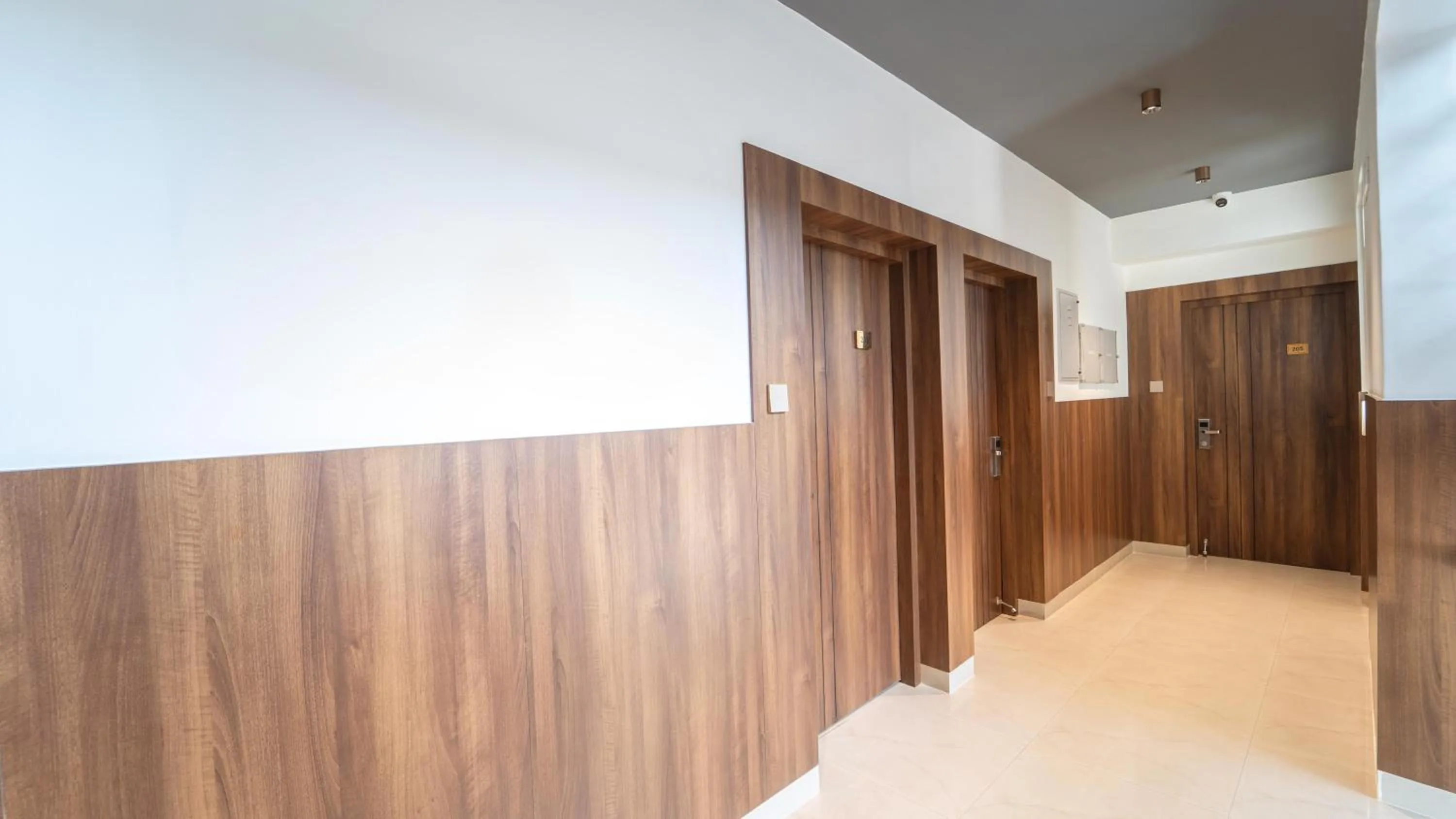 Lobby or reception, Bed in Treebo Petals Suites Marine Drive