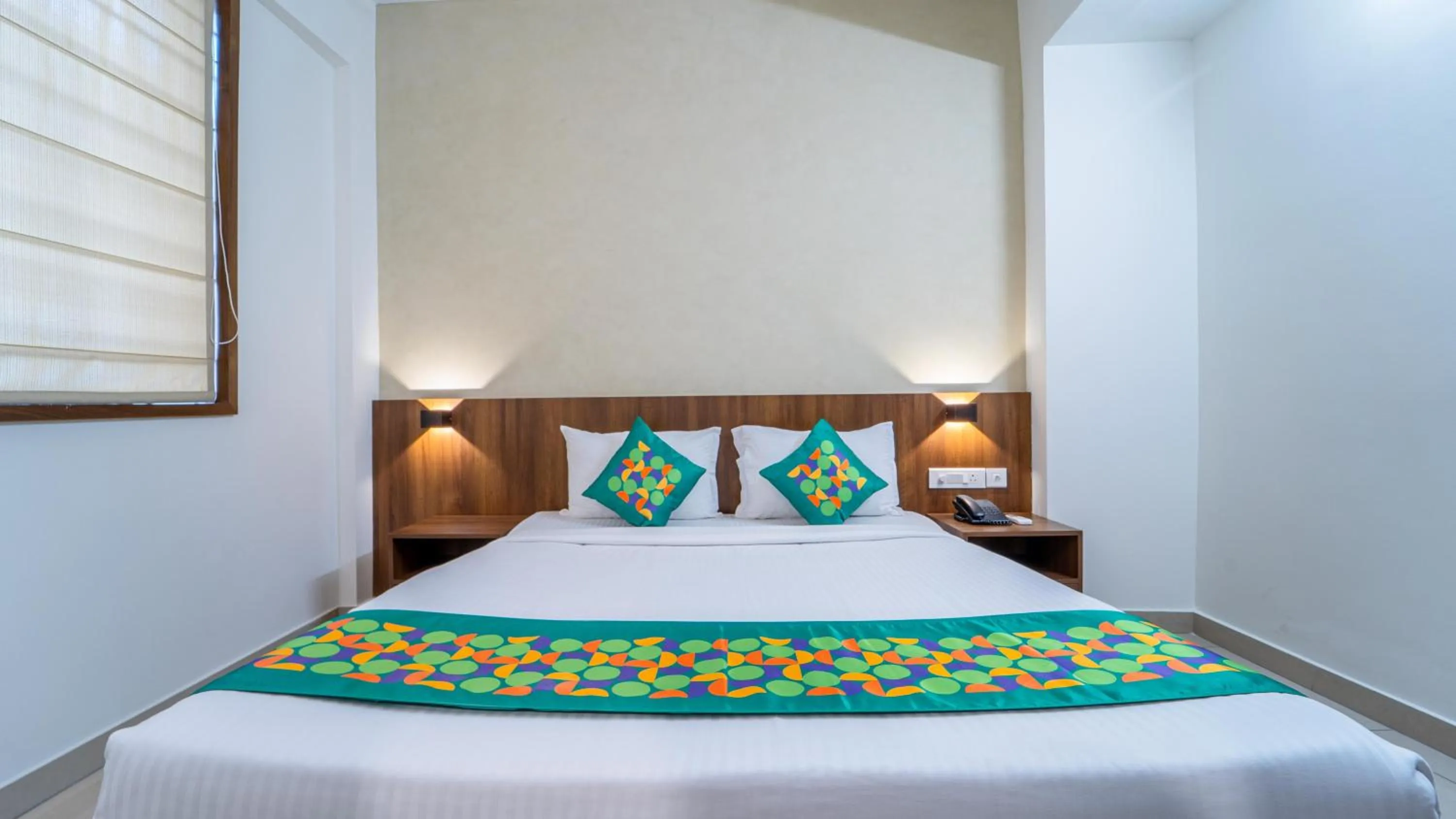 Bedroom, Bed in Treebo Petals Suites Marine Drive