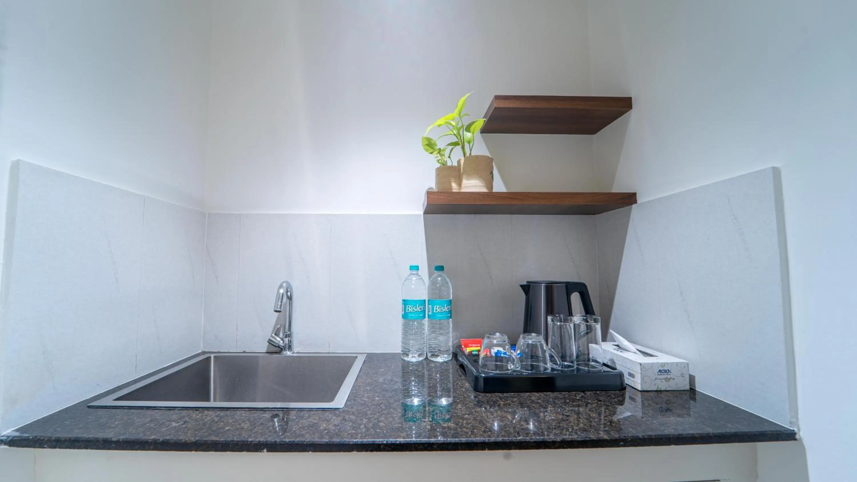 Kitchen or kitchenette in Treebo Petals Suites Marine Drive