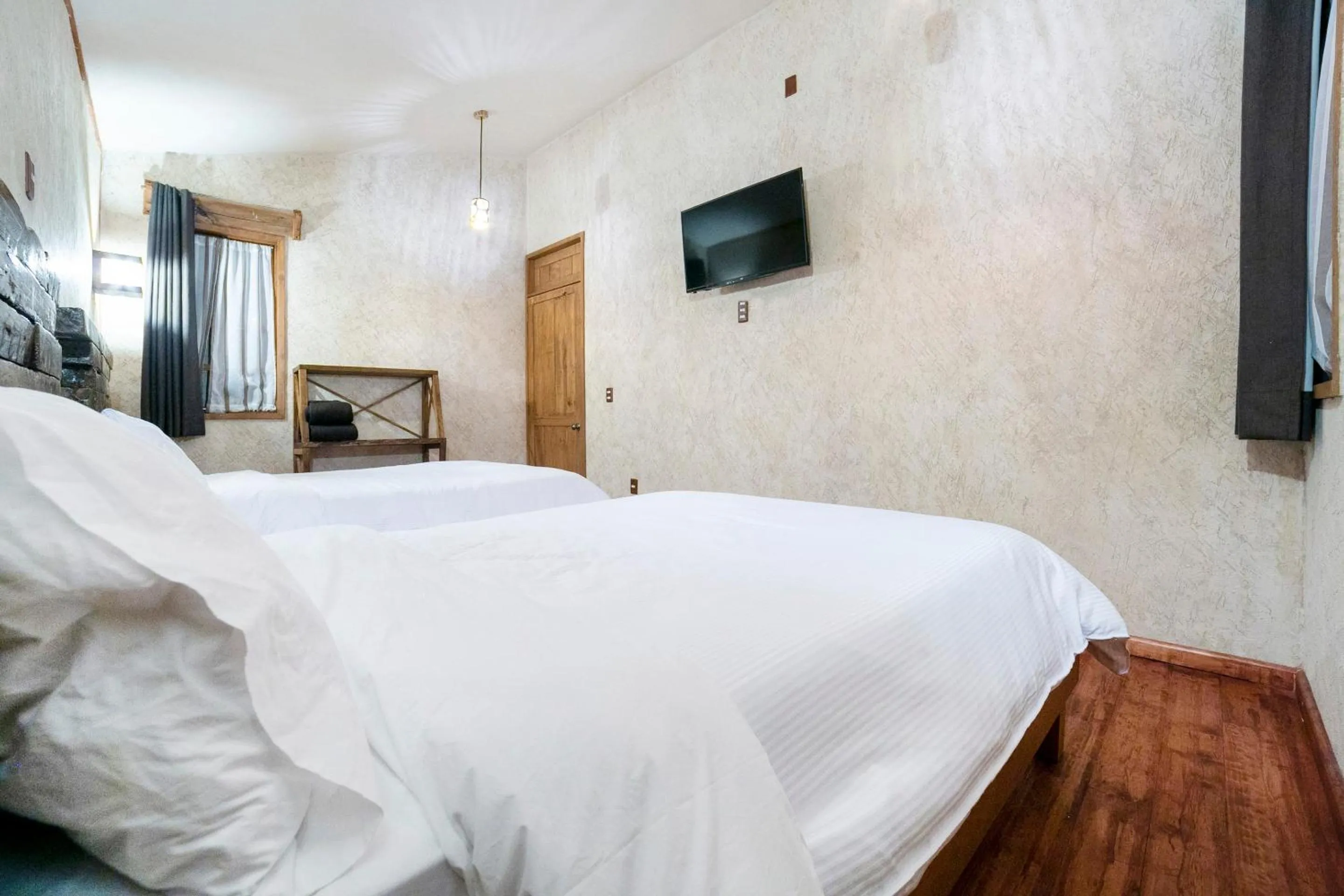 Bedroom in Capital O Collection O Casona De Minas Mineral del Monte