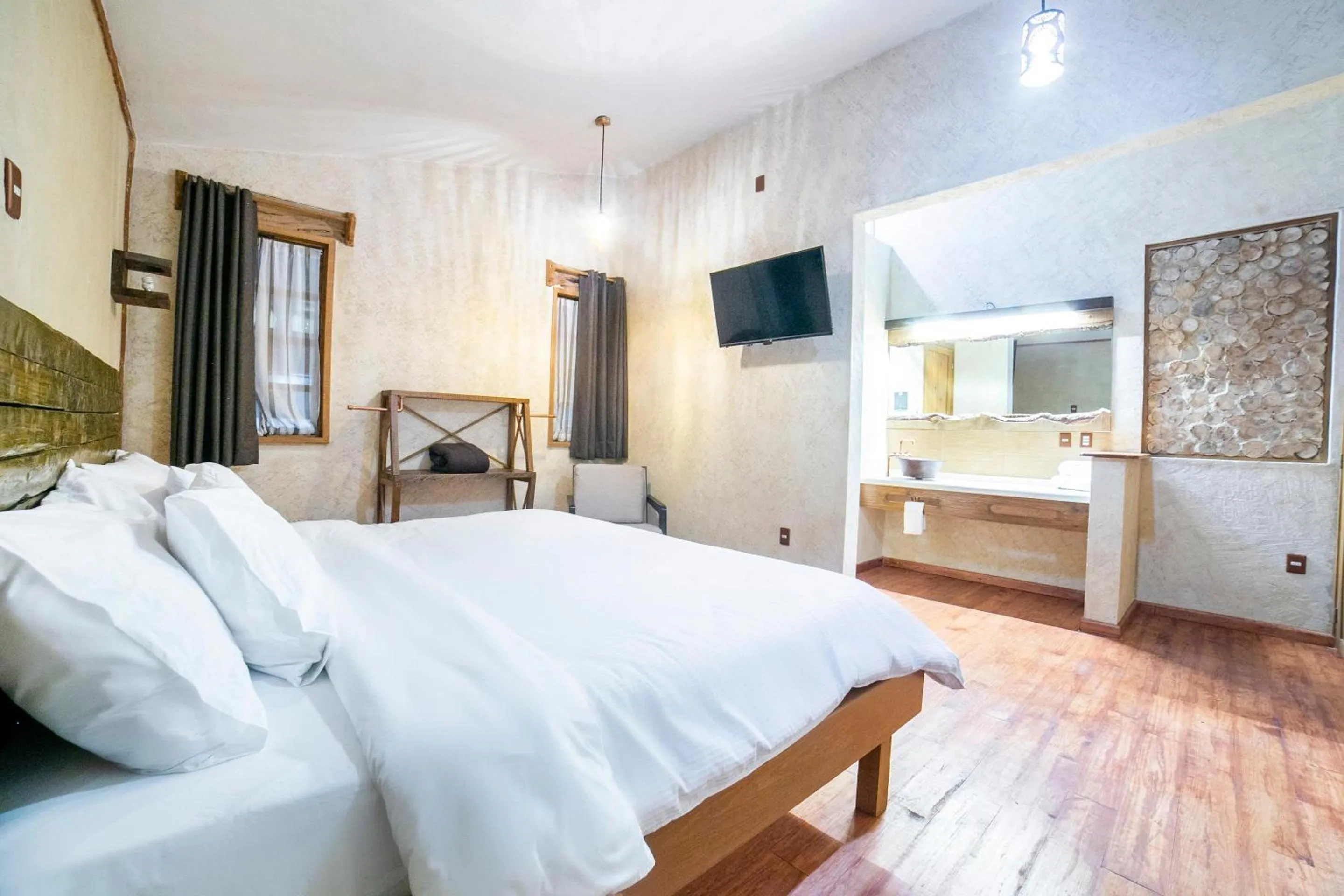 Bedroom in Capital O Collection O Casona De Minas Mineral del Monte