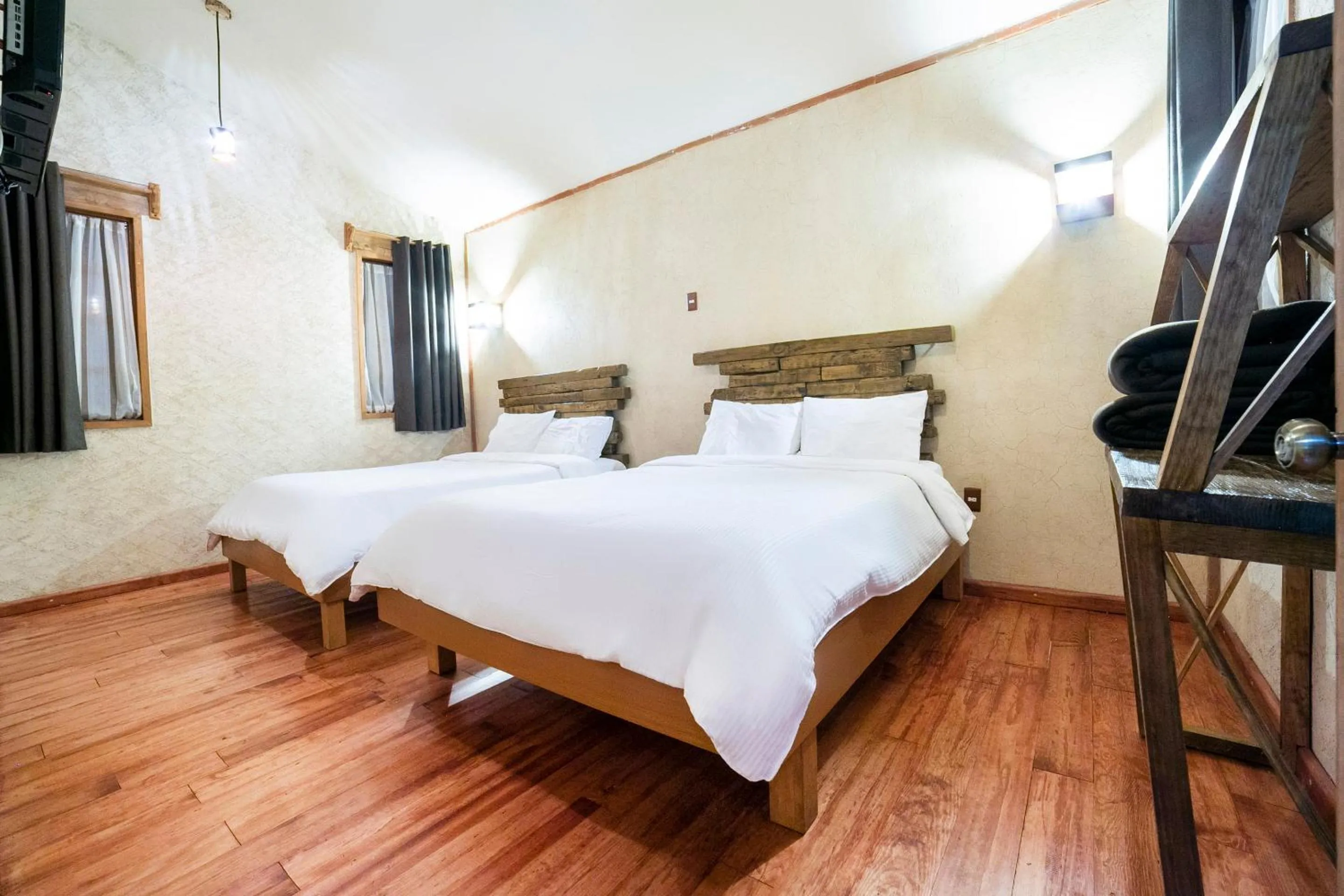 Bedroom in Capital O Collection O Casona De Minas Mineral del Monte