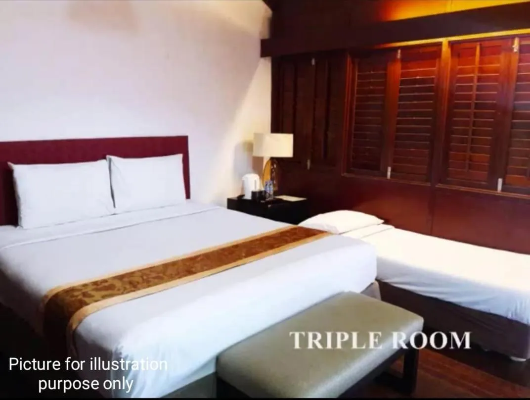 Bed in Shah's Beach Resort Melaka