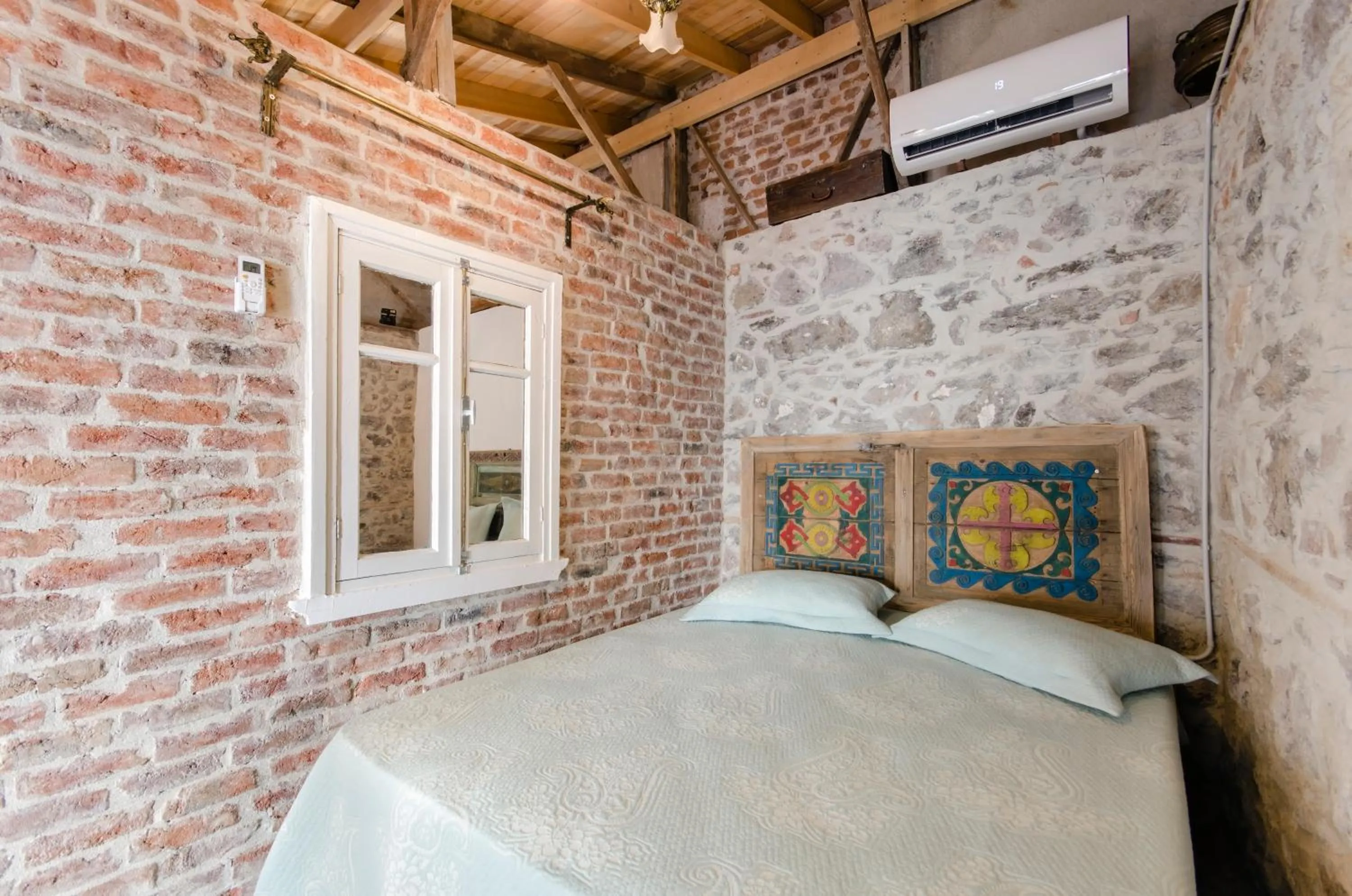 Bedroom, Bed in Iconic Stone Houses