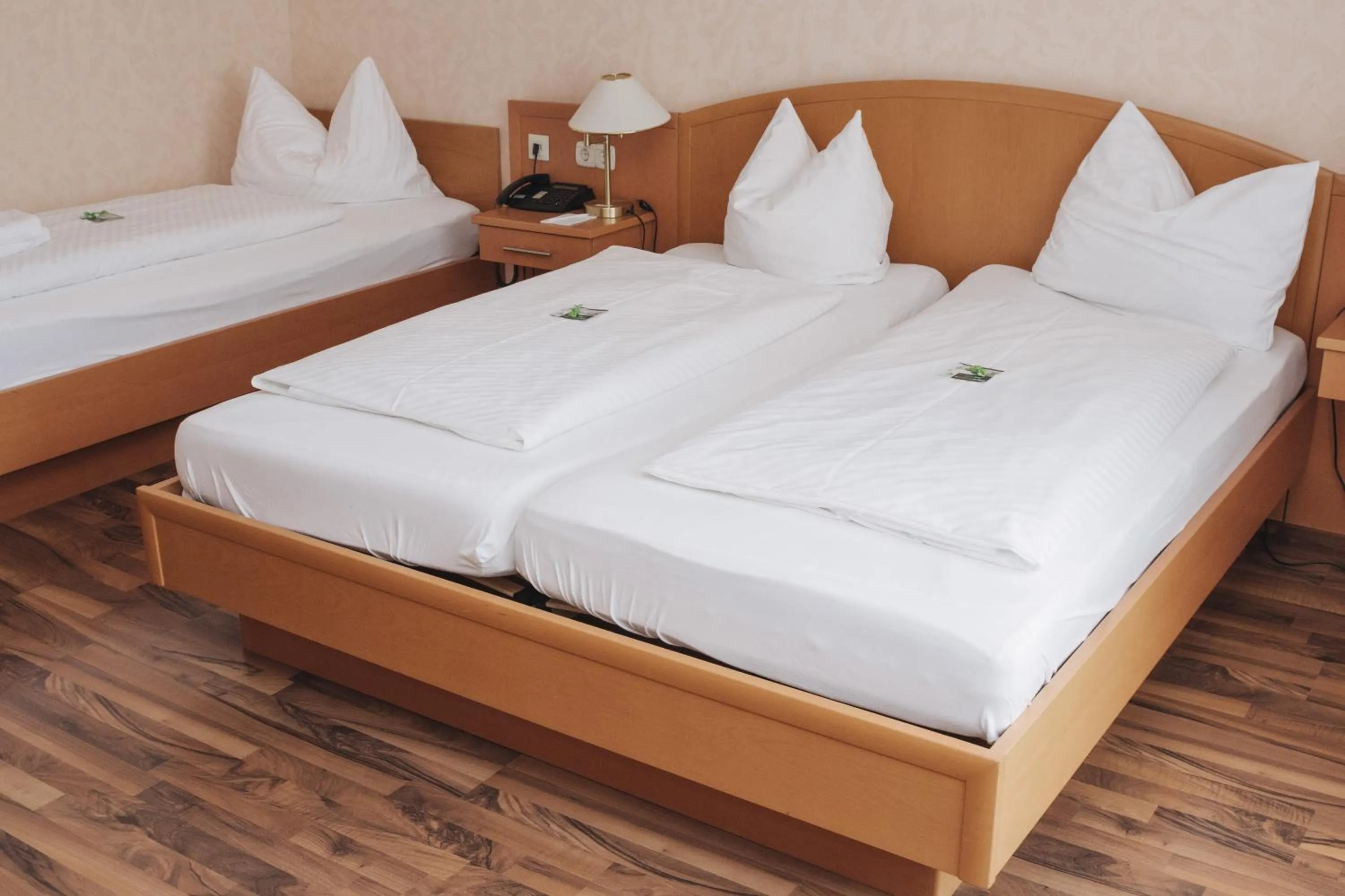 Bed in Flair Hotel Grüner Baum