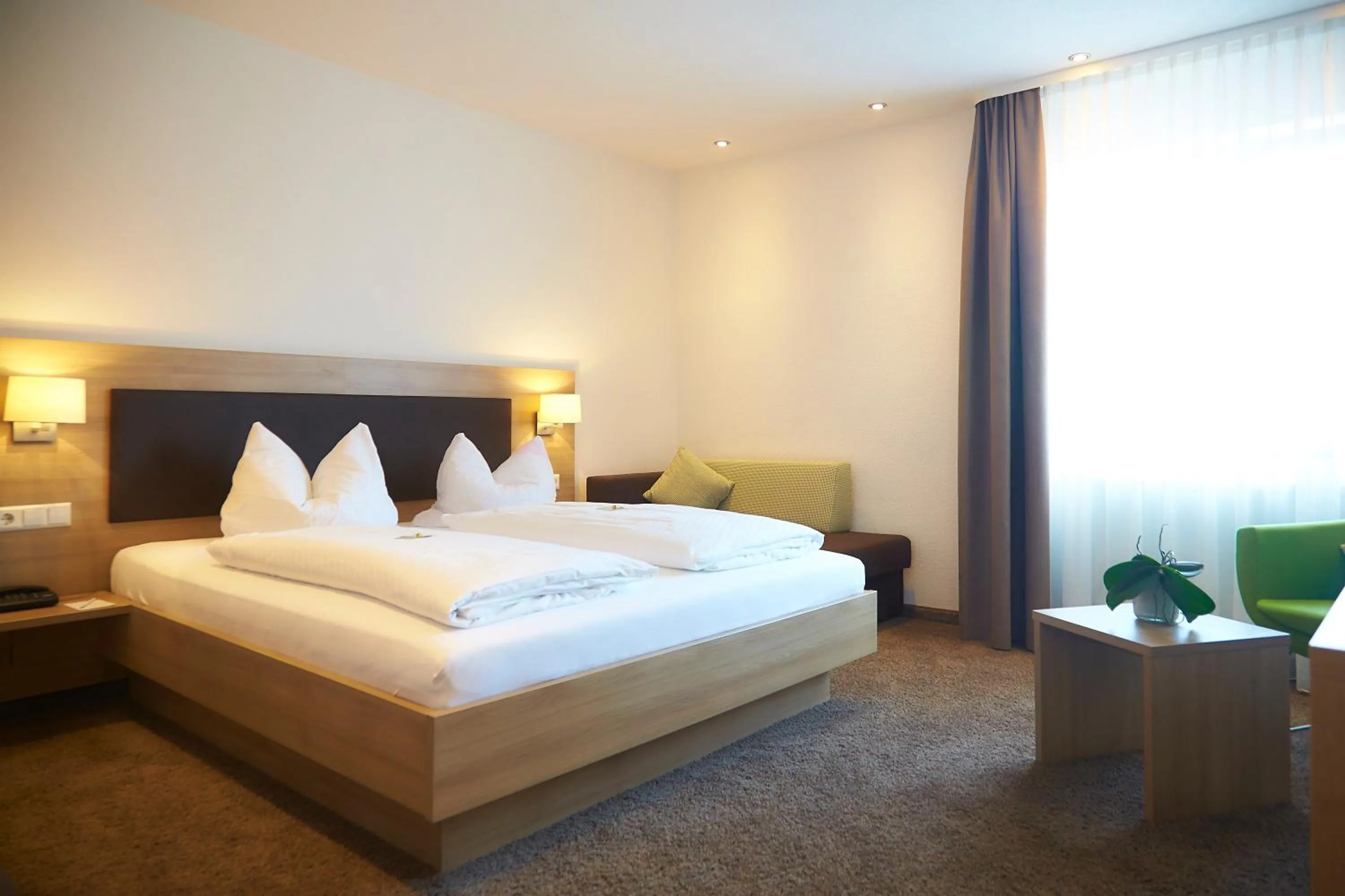 Photo of the whole room, Bed in Flair Hotel Grüner Baum