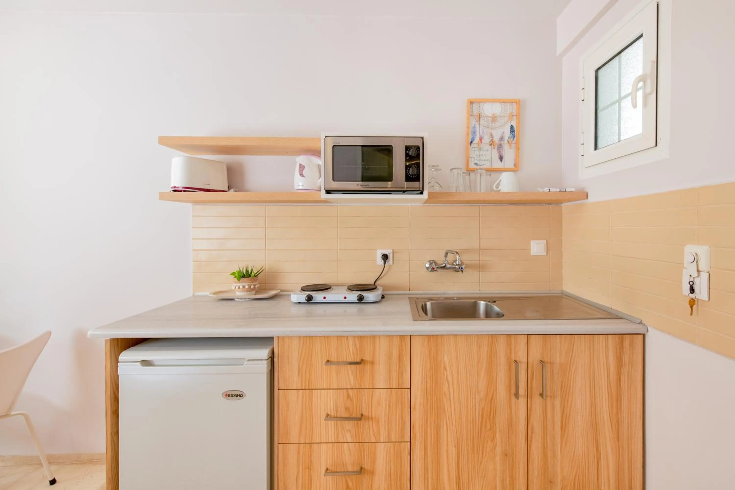 kitchen in KORINA APART HOTEL KAVOS