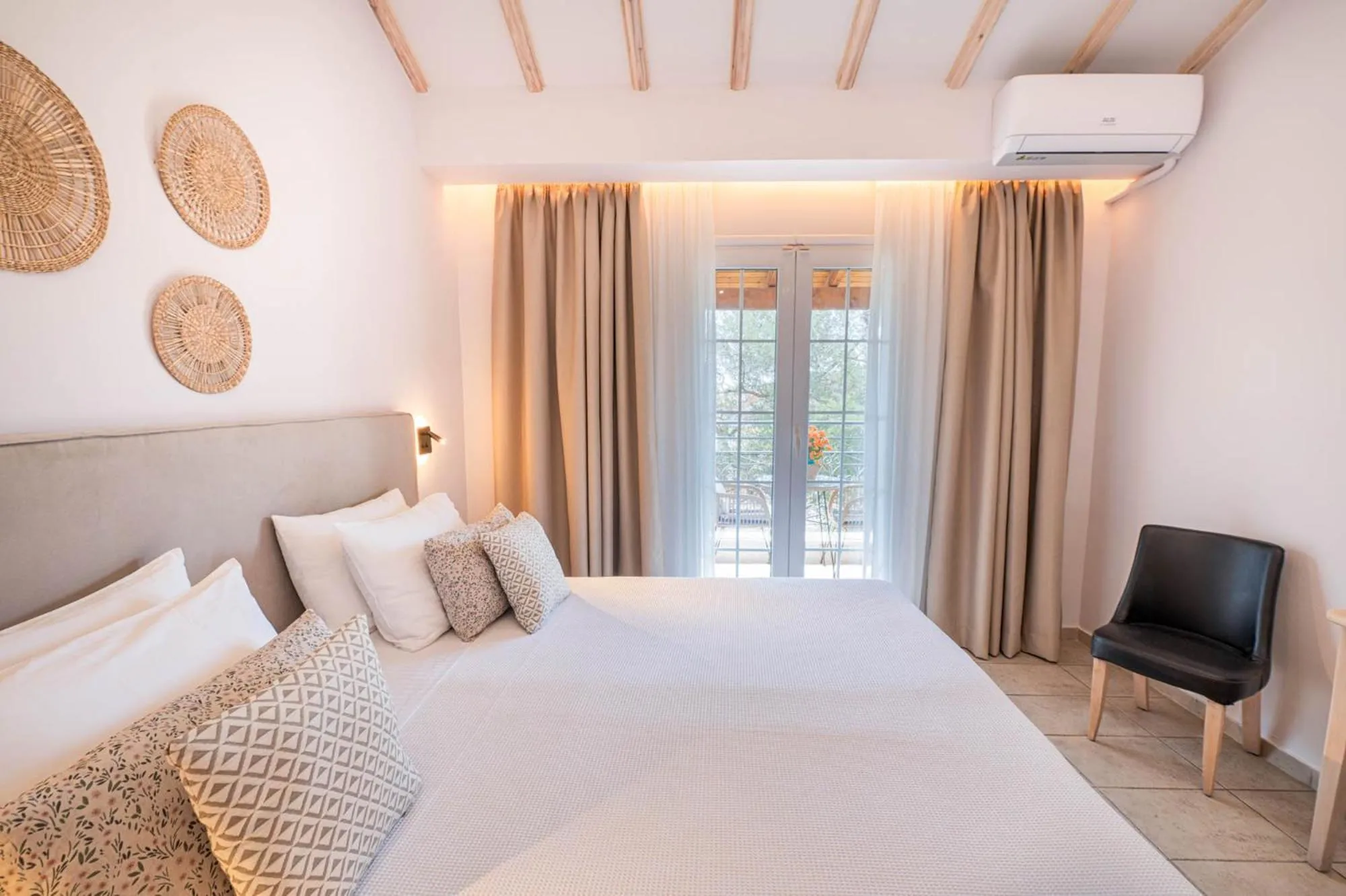 Bed in KORINA APART HOTEL KAVOS