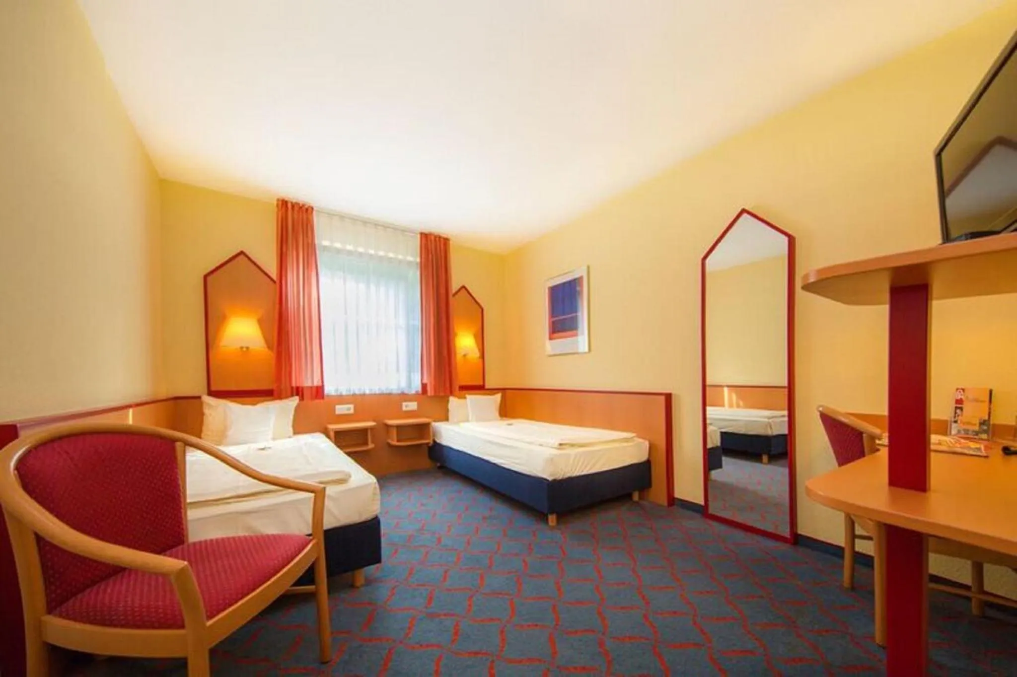 Photo of the whole room, Bed in Montana Hotel Senden