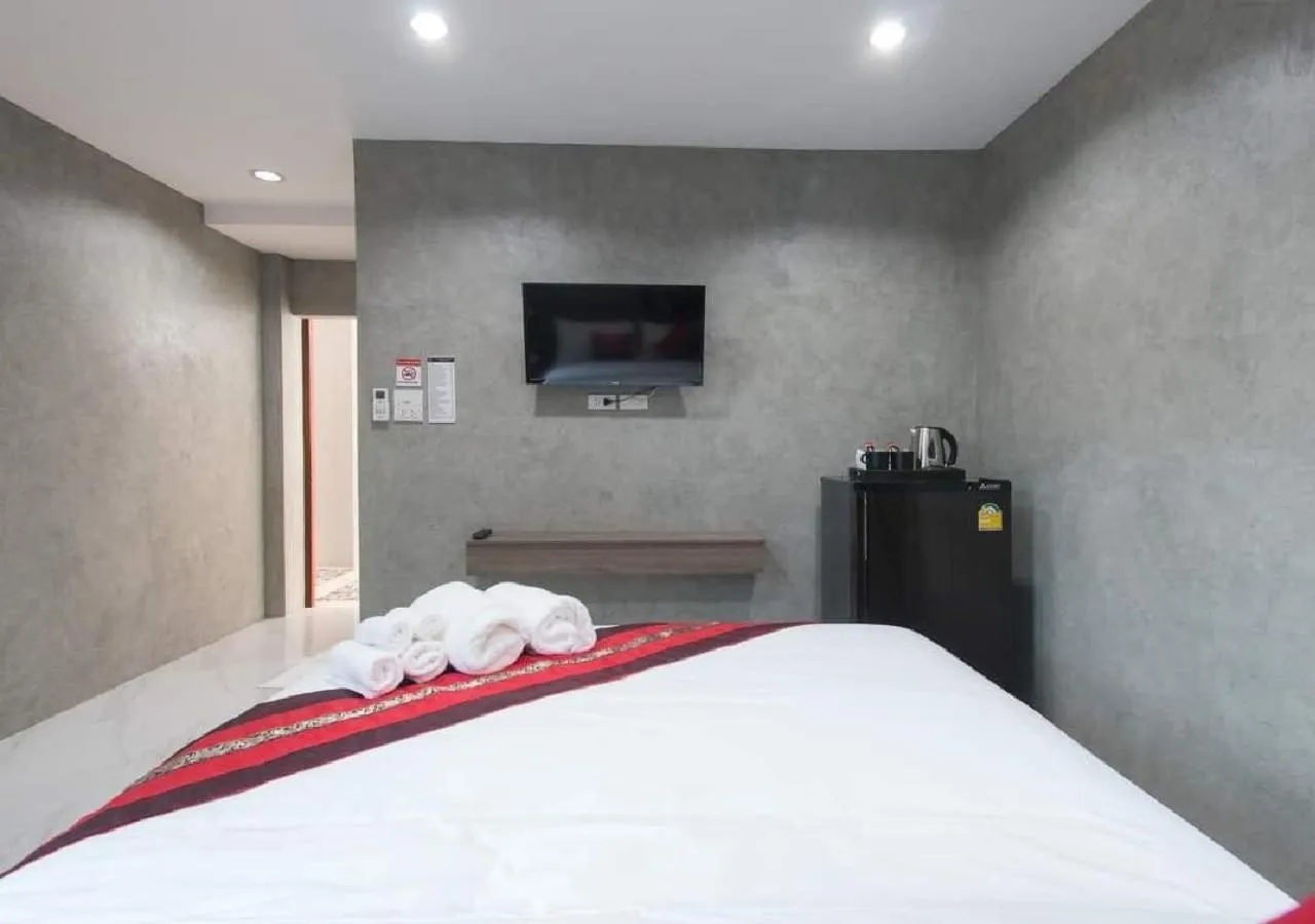 Bed in Puak Taem Boutique Hotel