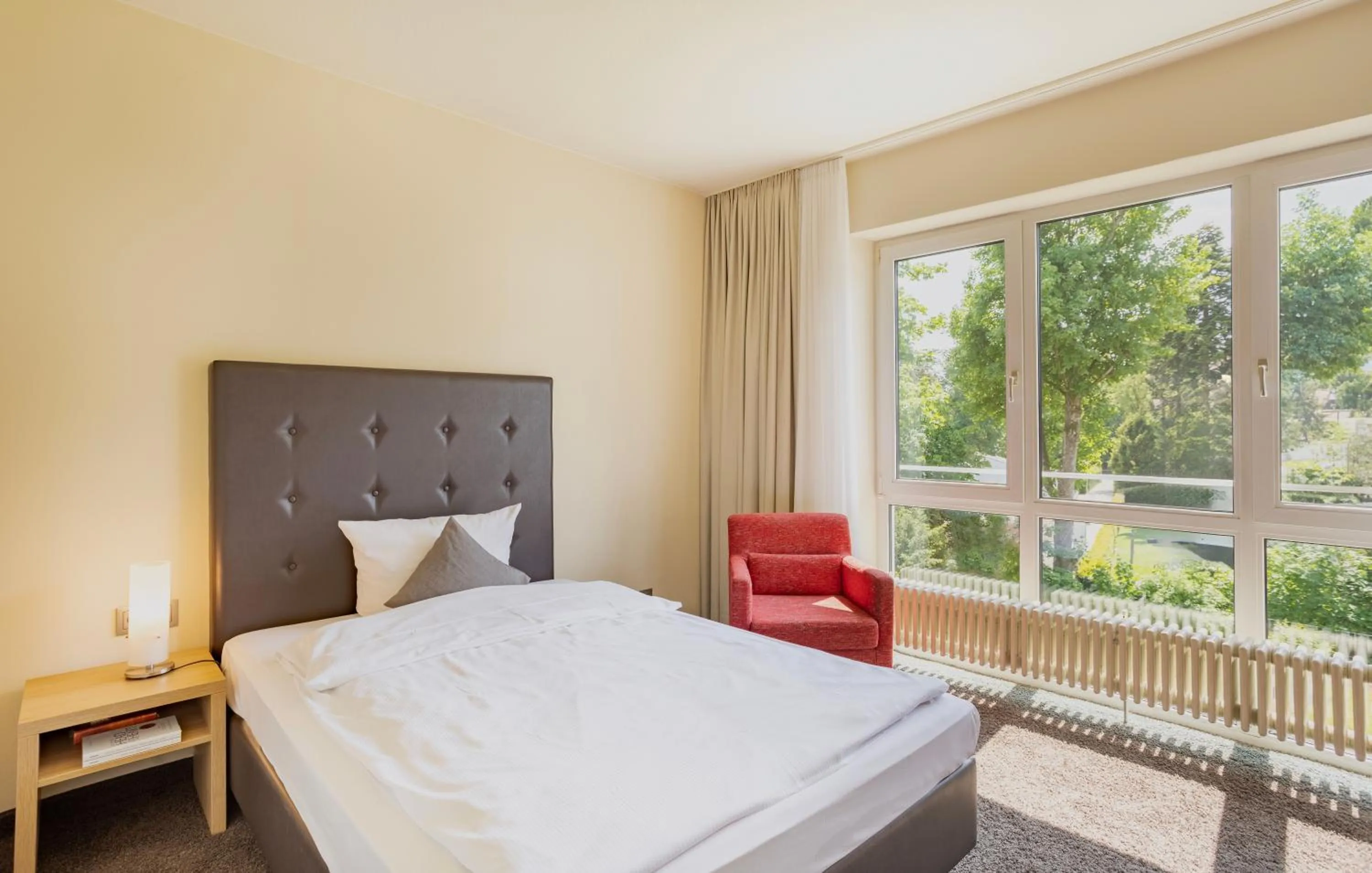 Photo of the whole room, Bed in Concorde Hotel Viktoria