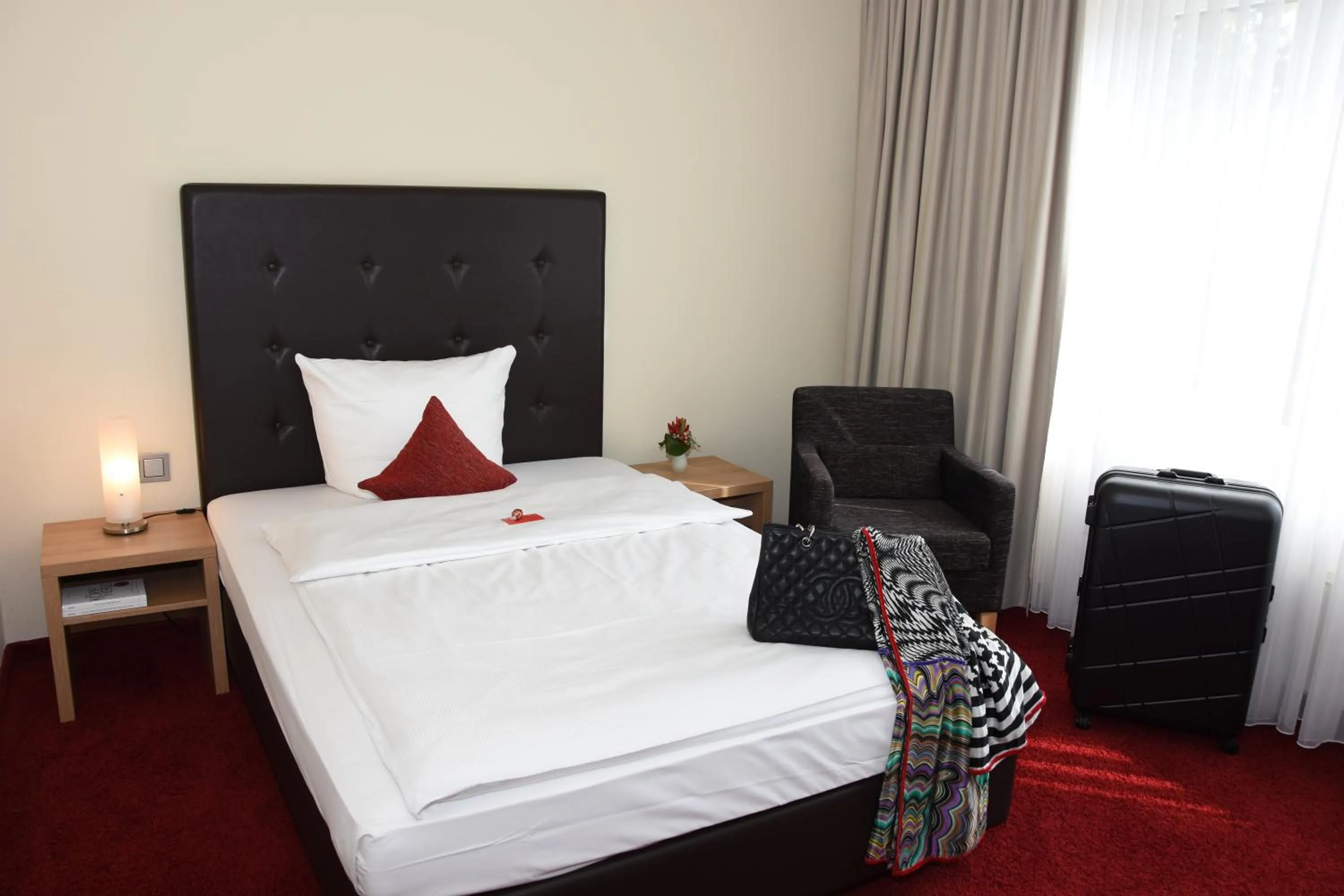 Bed in Concorde Hotel Viktoria