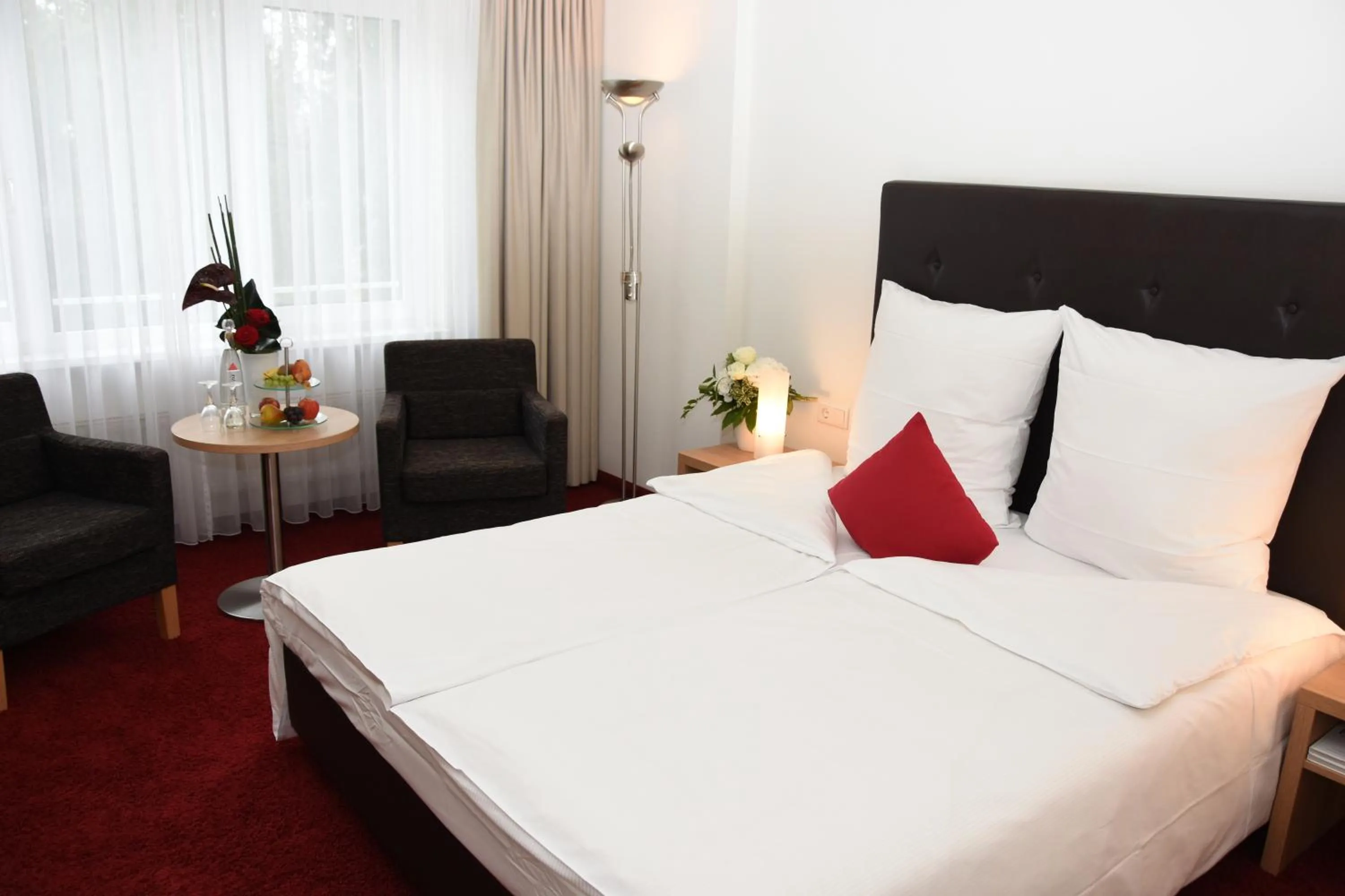 Bed in Concorde Hotel Viktoria