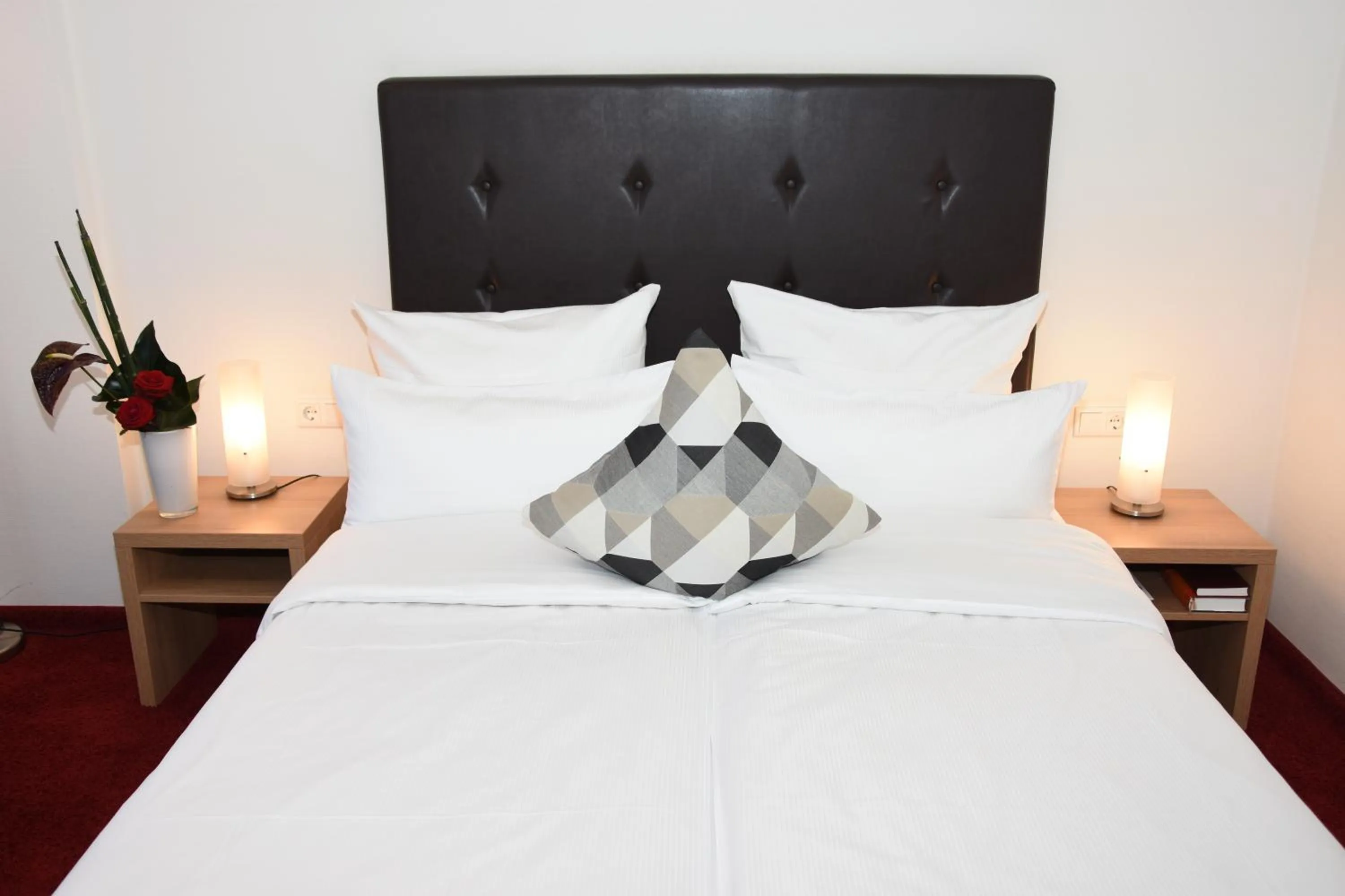 Bed in Concorde Hotel Viktoria