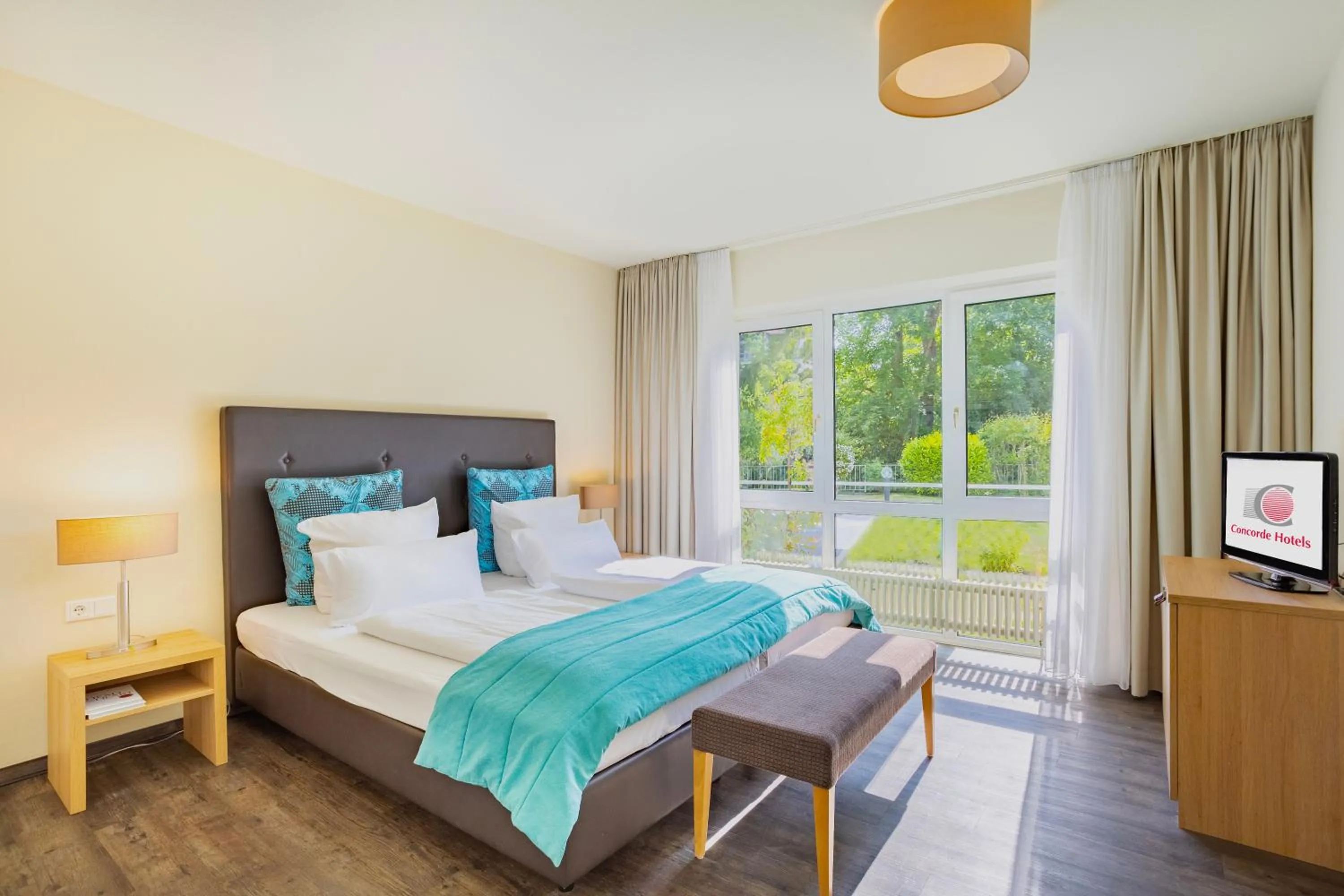 Bedroom, Bed in Concorde Hotel Viktoria