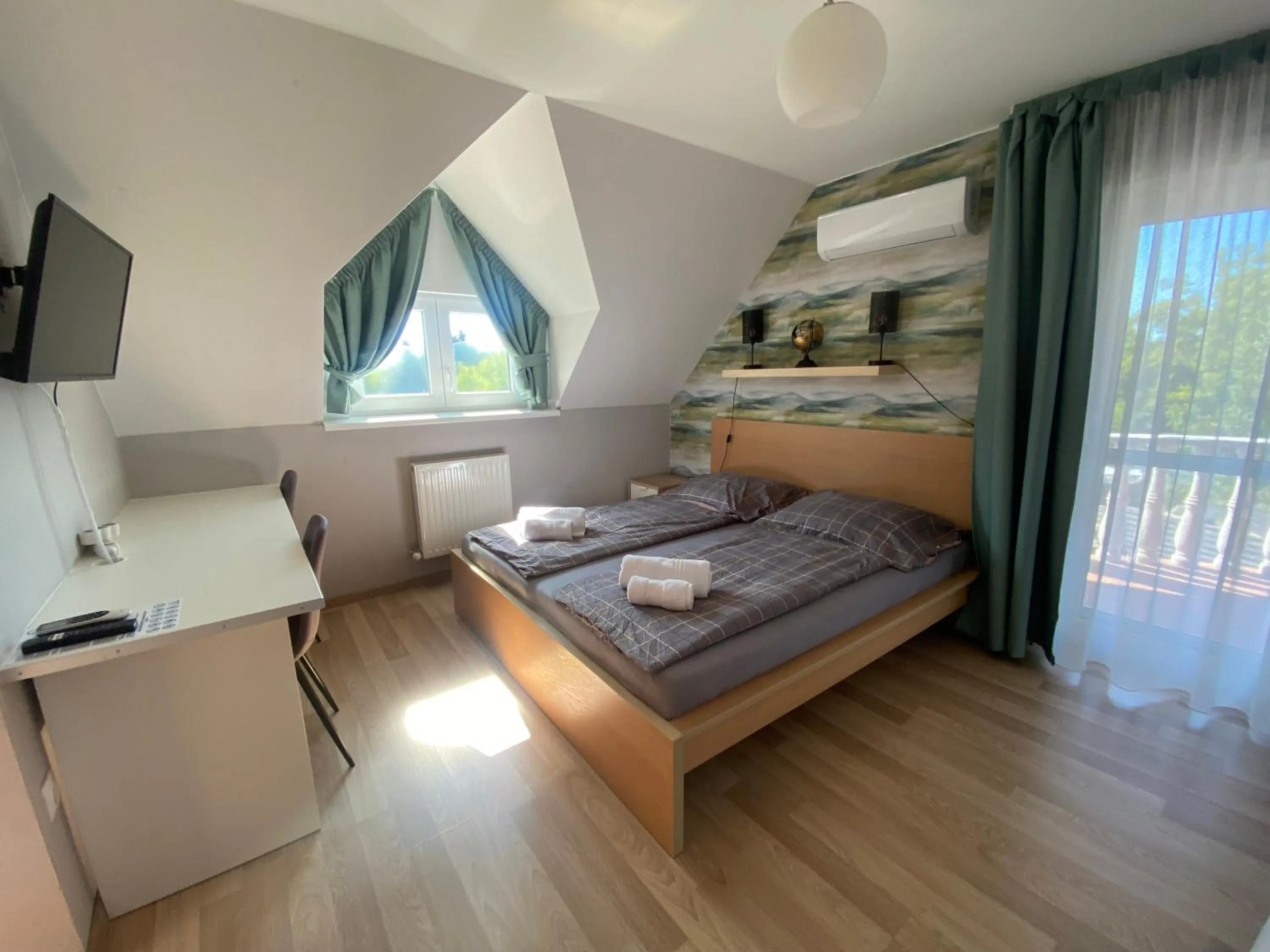 Bed in Oázis Panzió