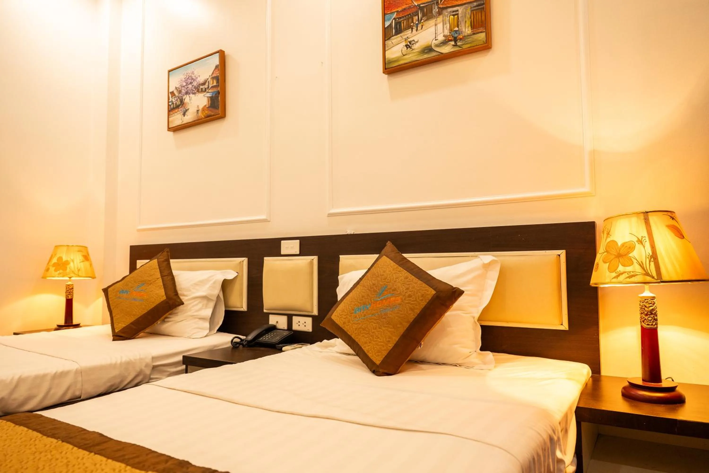 Bed in Chariot Hotel