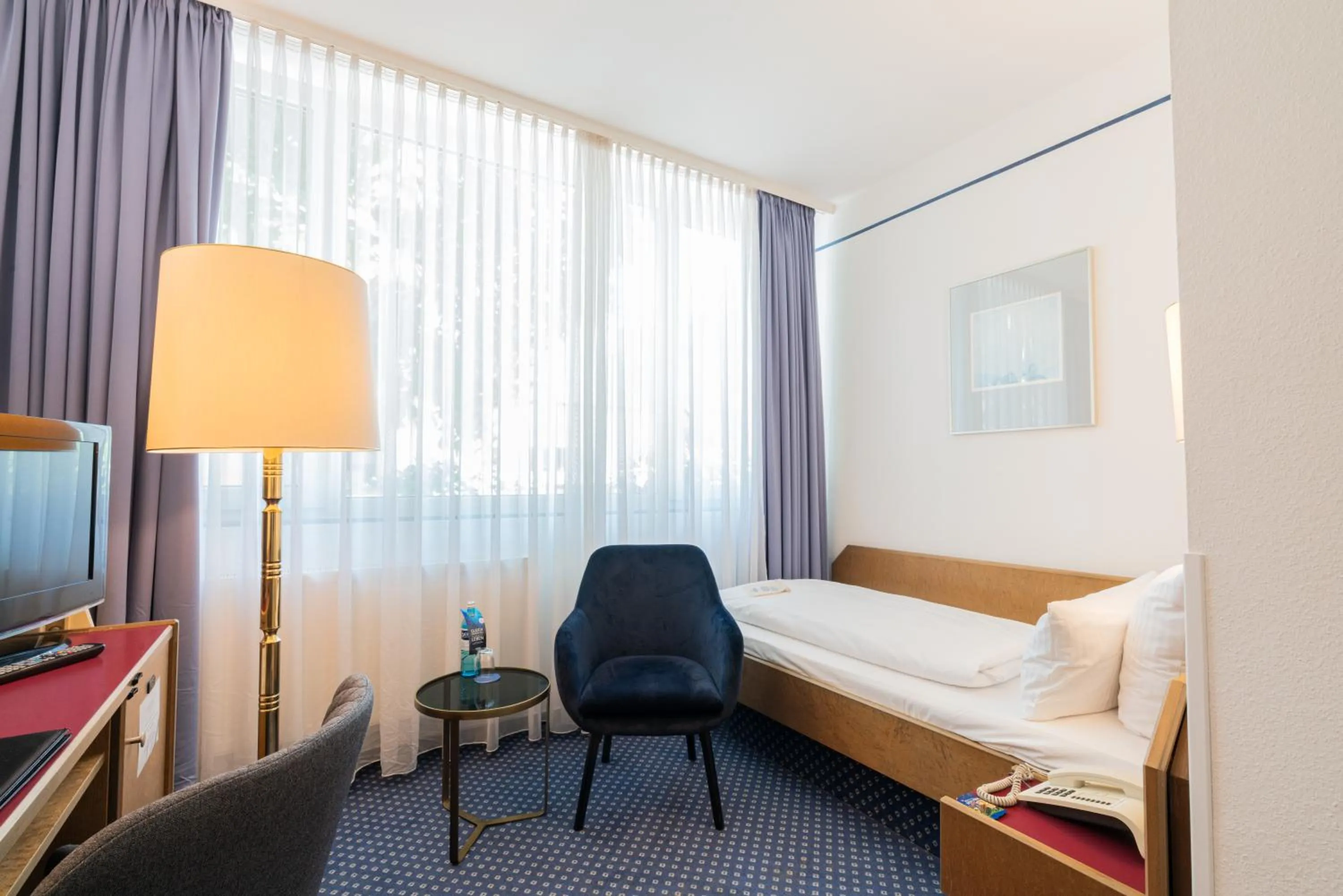 Bed in Parkhotel Bad Homburg