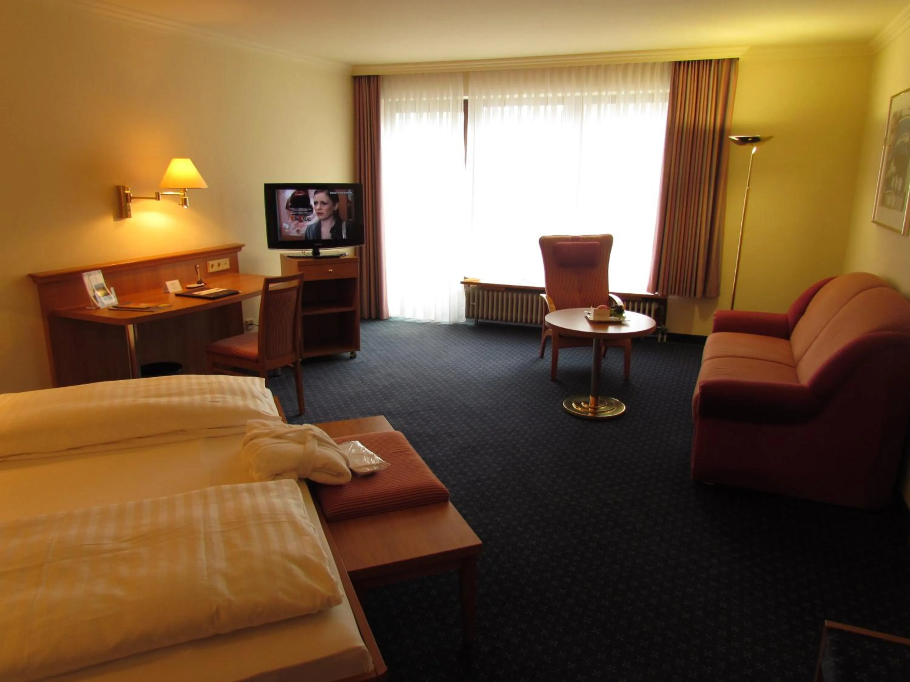 Photo of the whole room, Bed in Parkhotel Bad Homburg