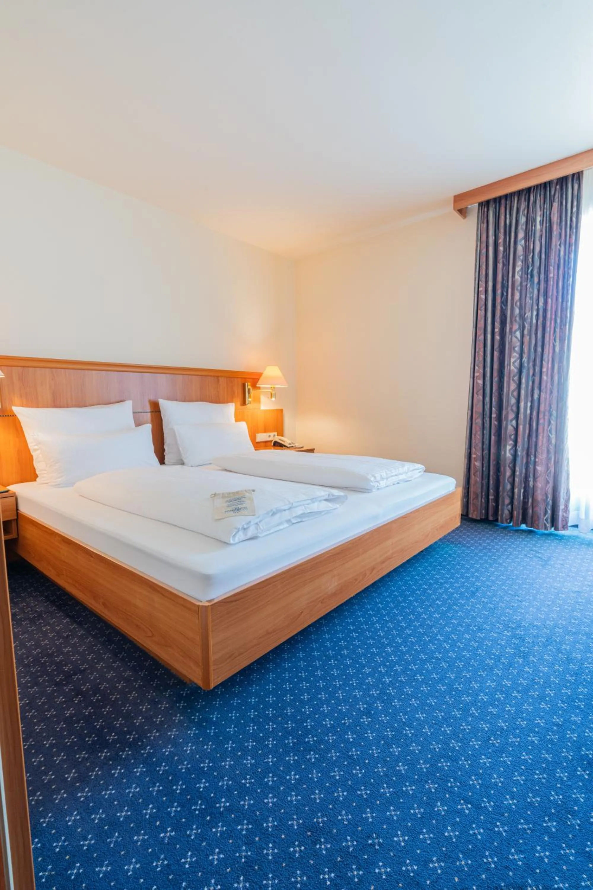 Bed in Parkhotel Bad Homburg