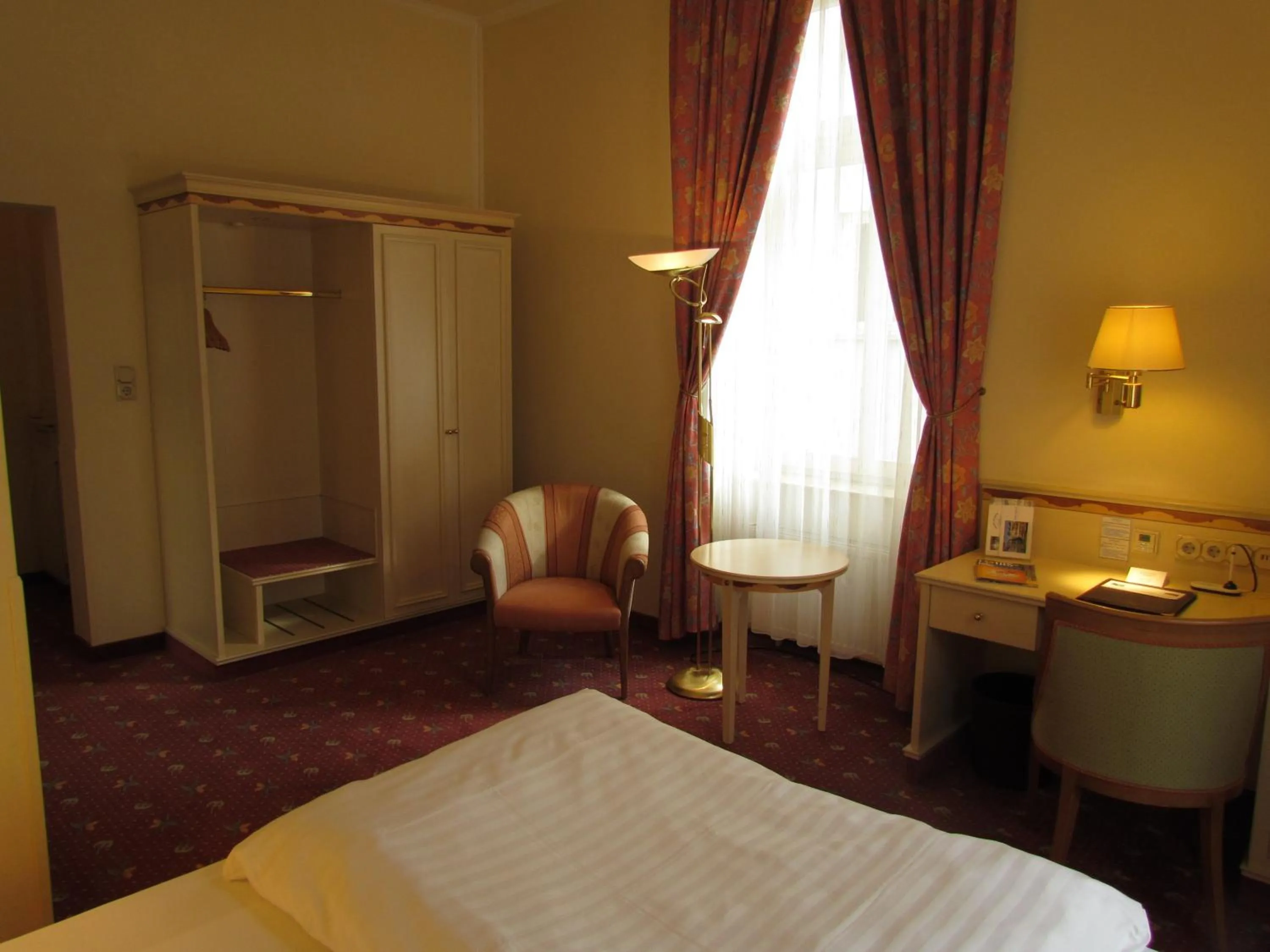 Photo of the whole room, Bed in Parkhotel Bad Homburg