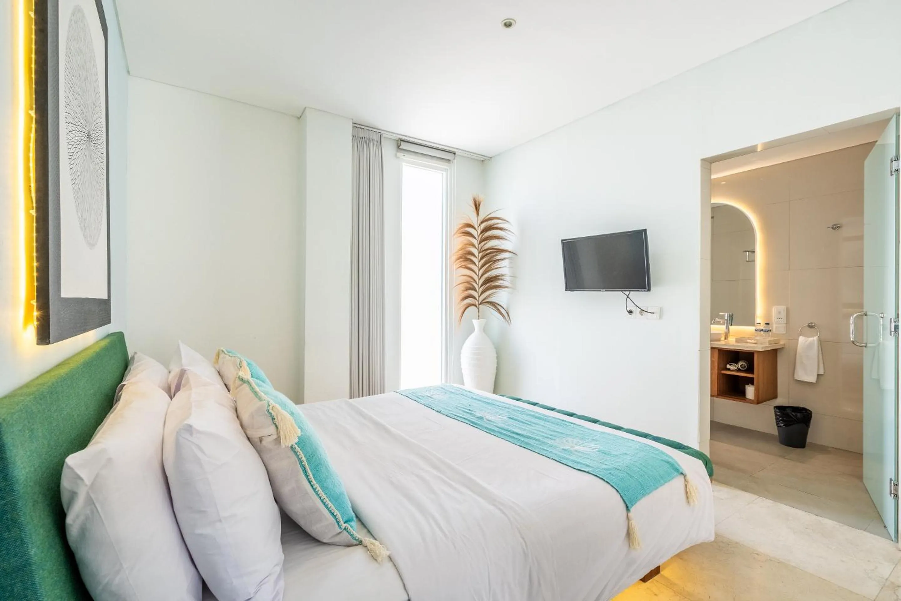 Bed in AQ-VA Hotel & Villas Seminyak