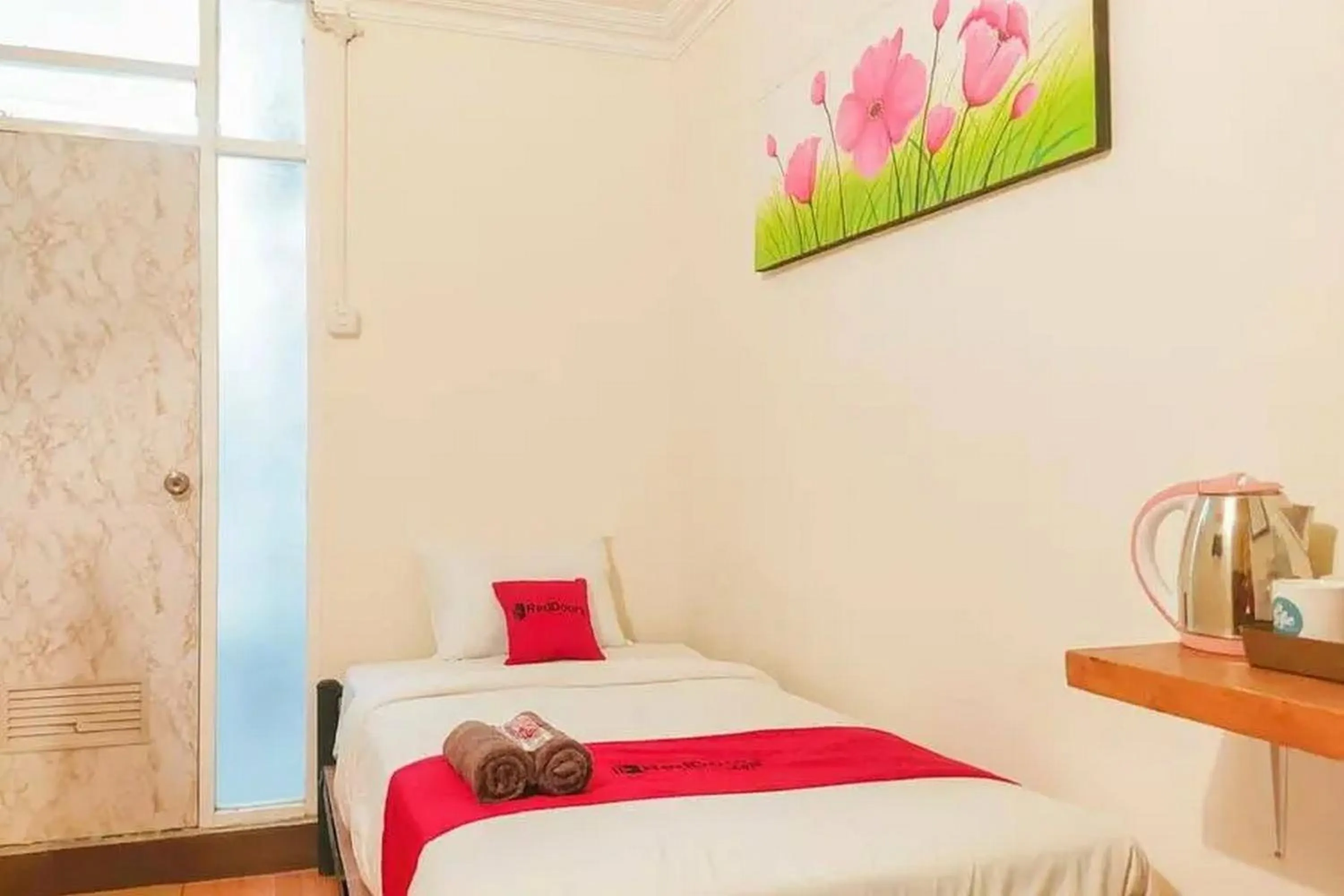 Bed in RedDoorz Syariah at Prapen Jaya Surabaya