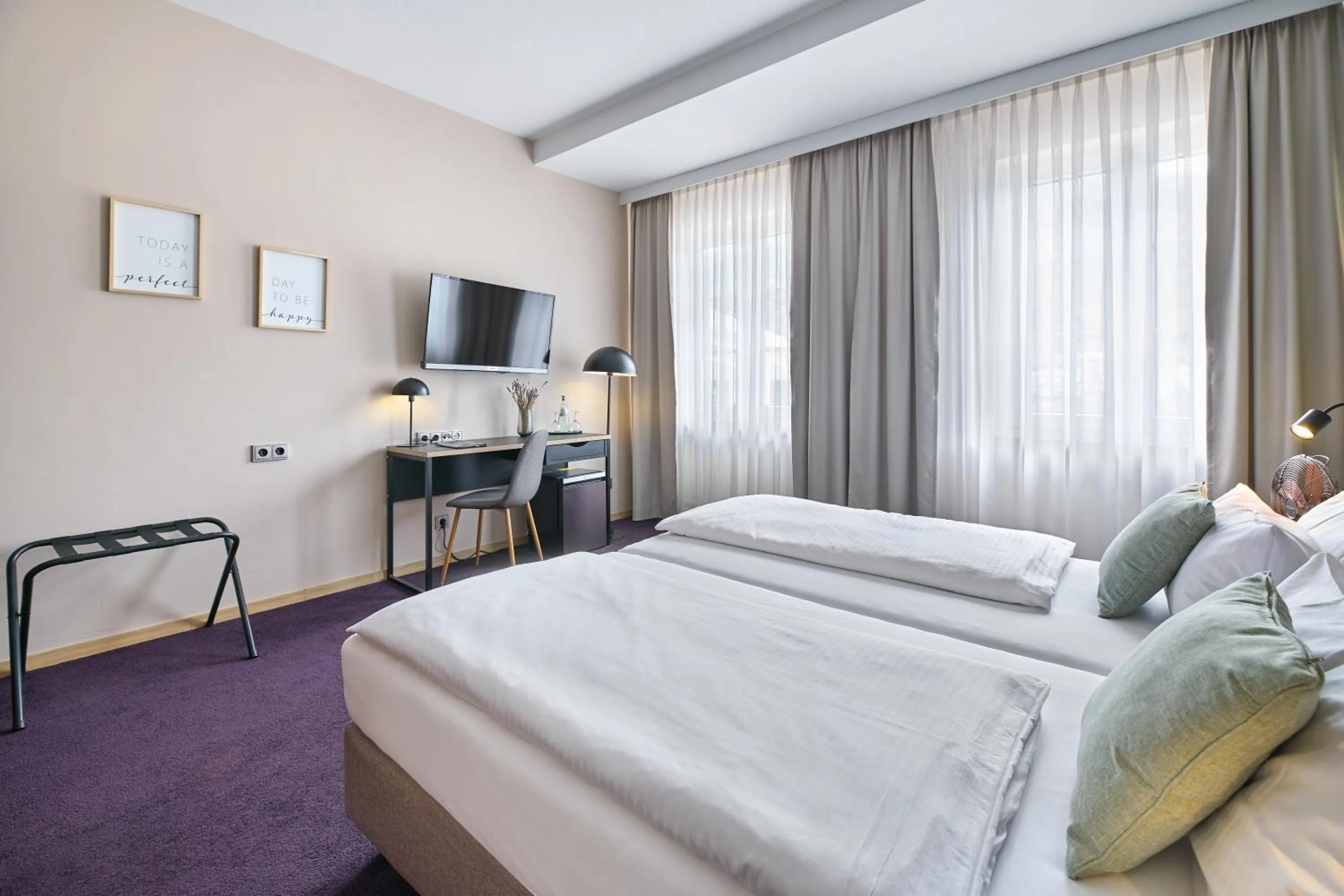 Bed in Hotel Germania