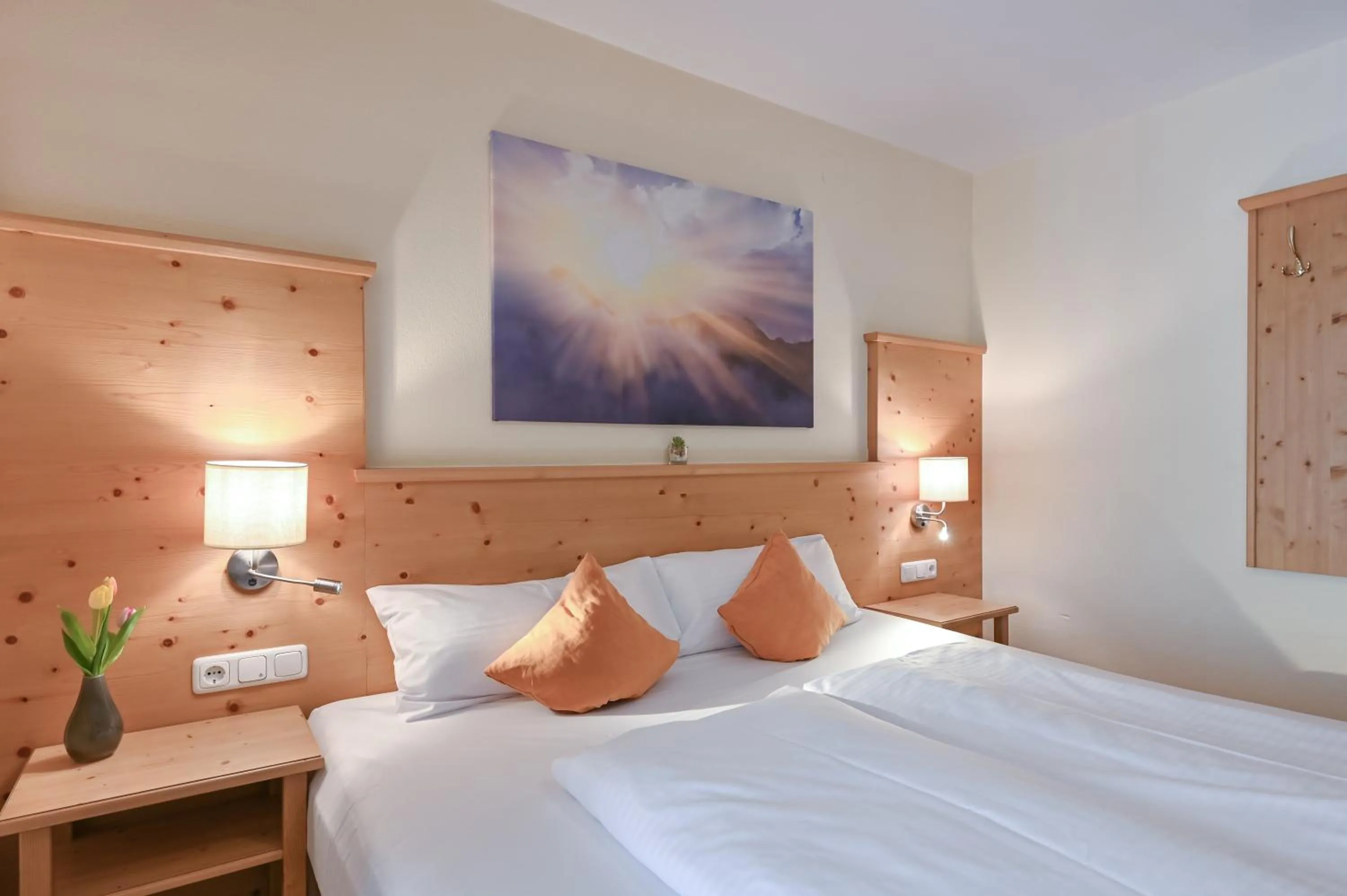 Bed in Hotel Alpenstuben