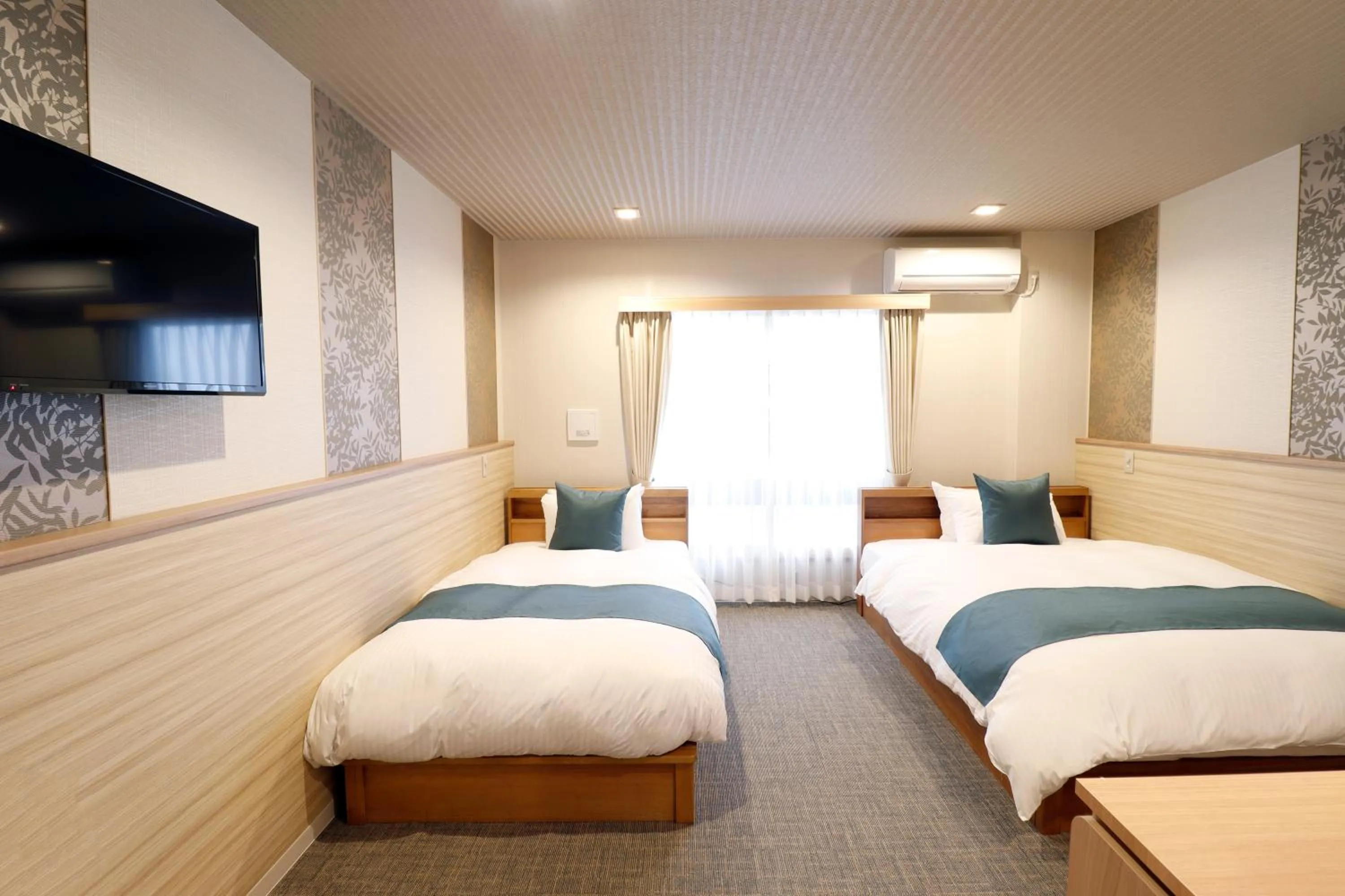 Bed in Stay SAKURA Kyoto Tambaguchi