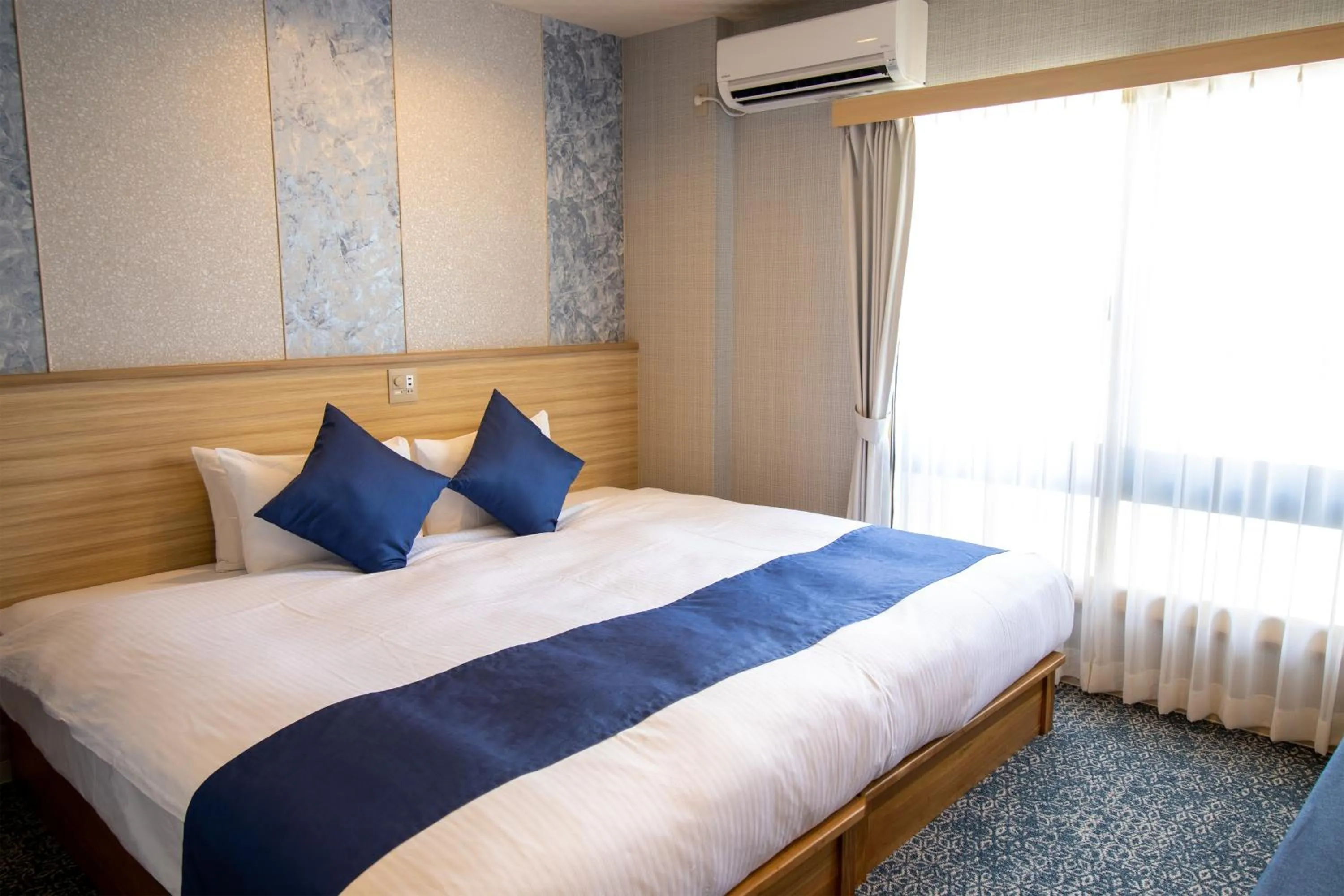 Bed in Stay SAKURA Kyoto Tambaguchi