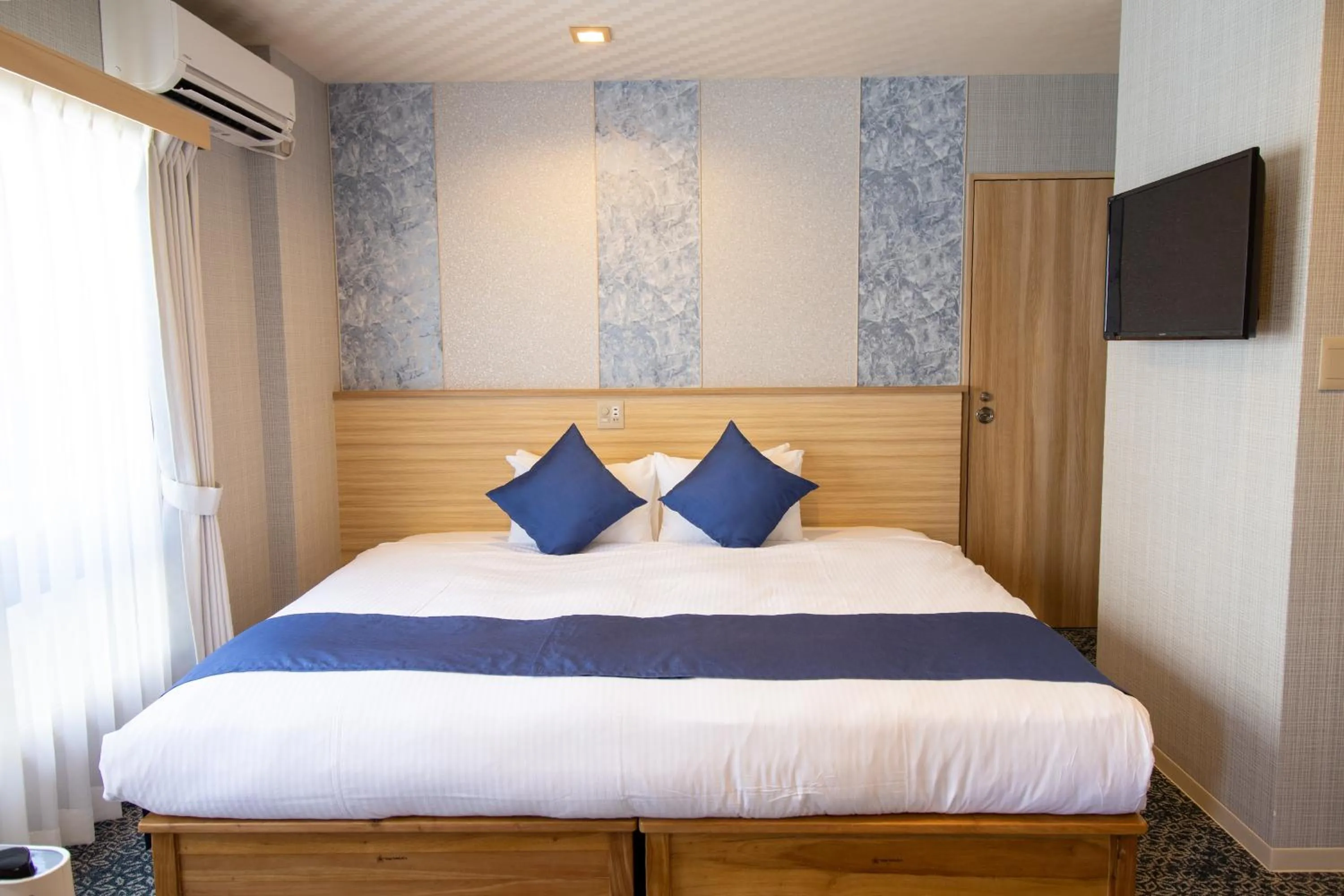 Bed in Stay SAKURA Kyoto Tambaguchi