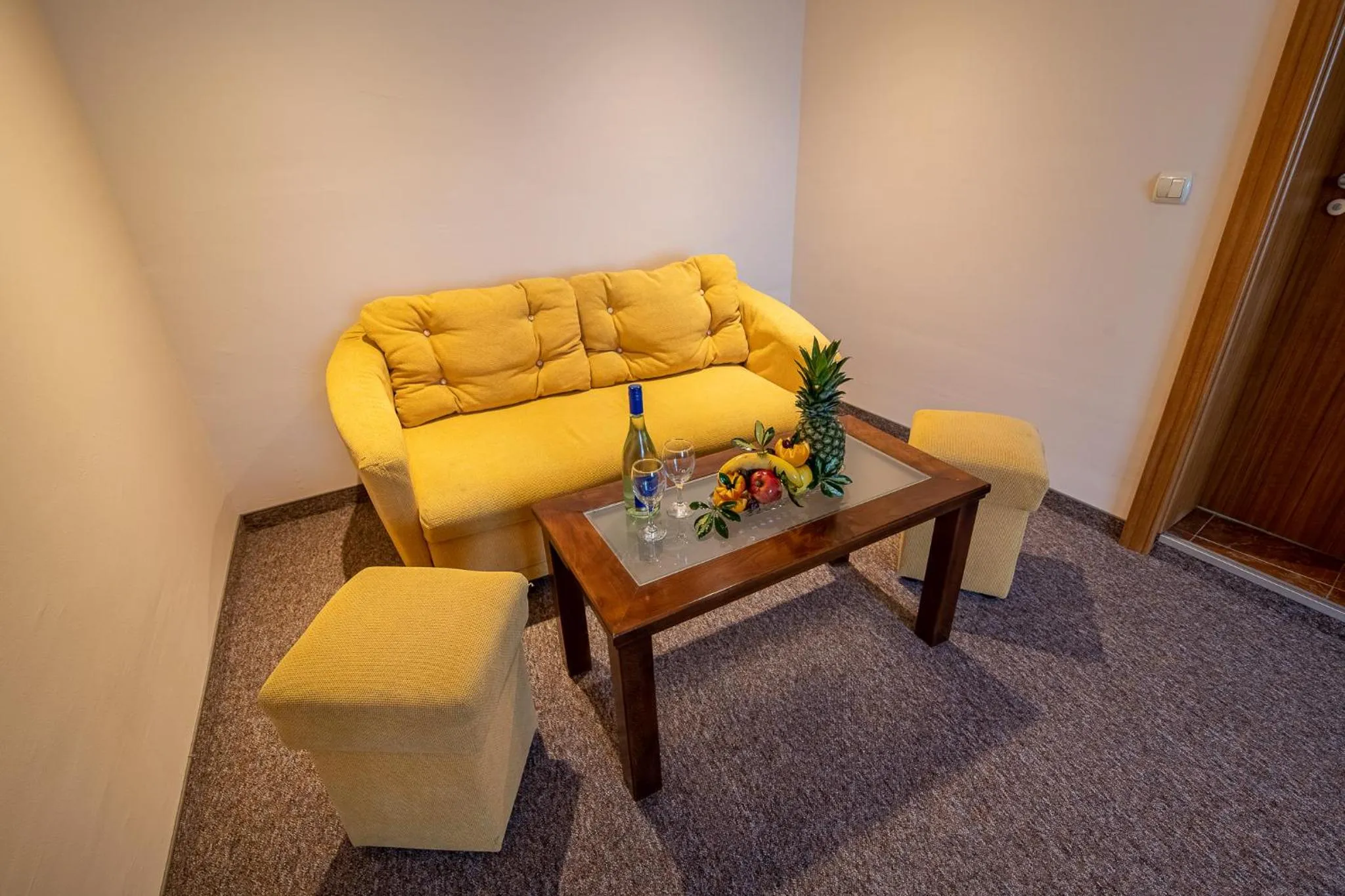 Seating area in Adamo Hotel