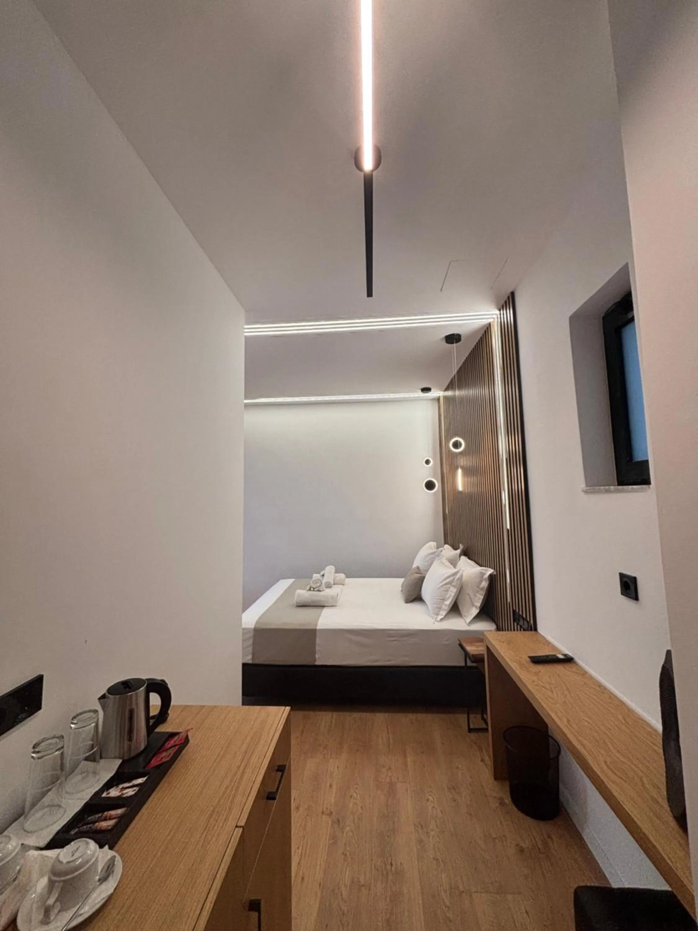 Bed in Ampoulos Rooms & Apartments