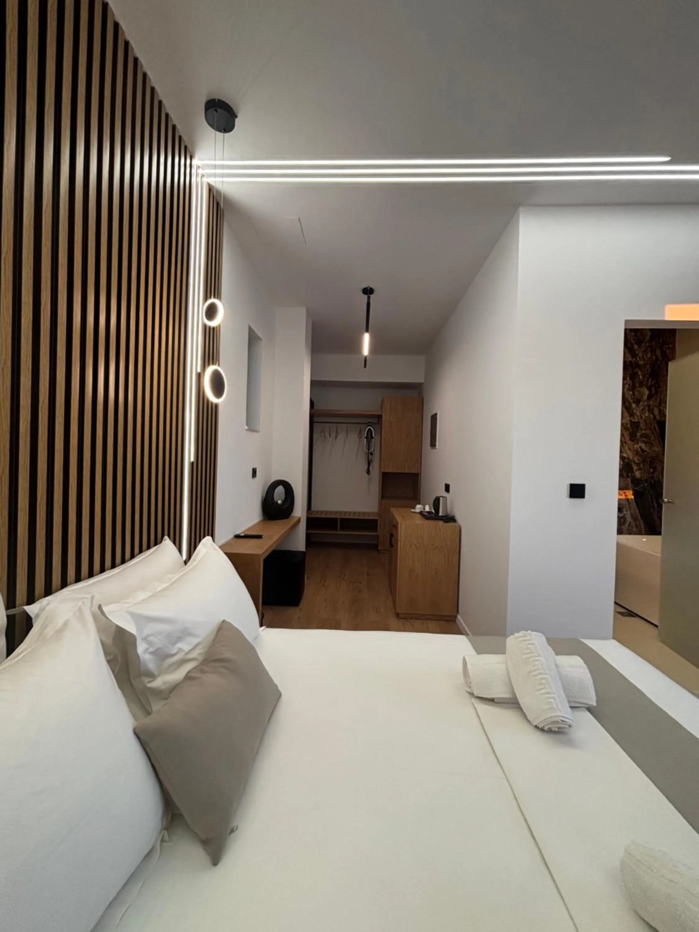 Bed in Ampoulos Rooms & Apartments