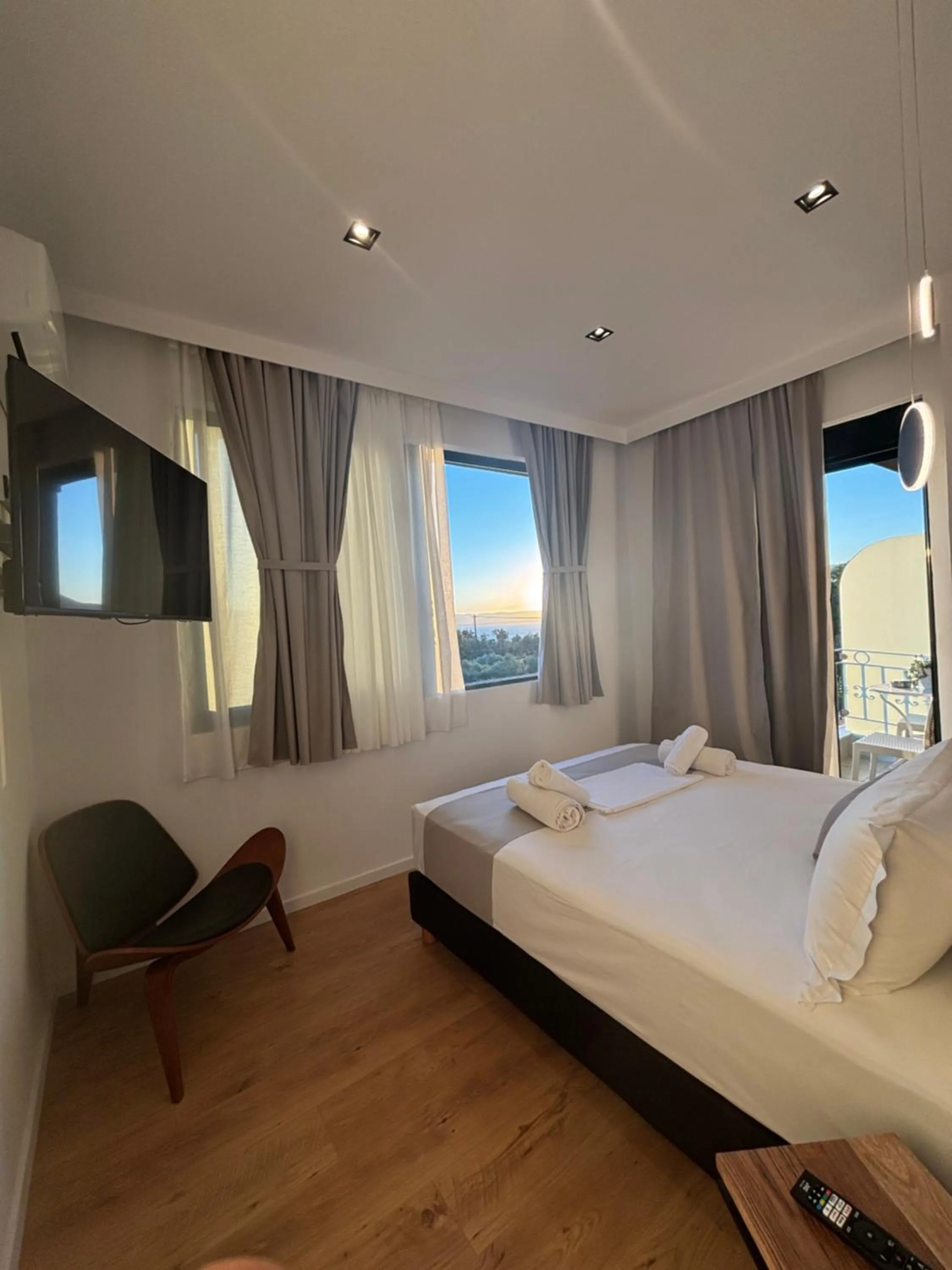 Bed in Ampoulos Rooms & Apartments