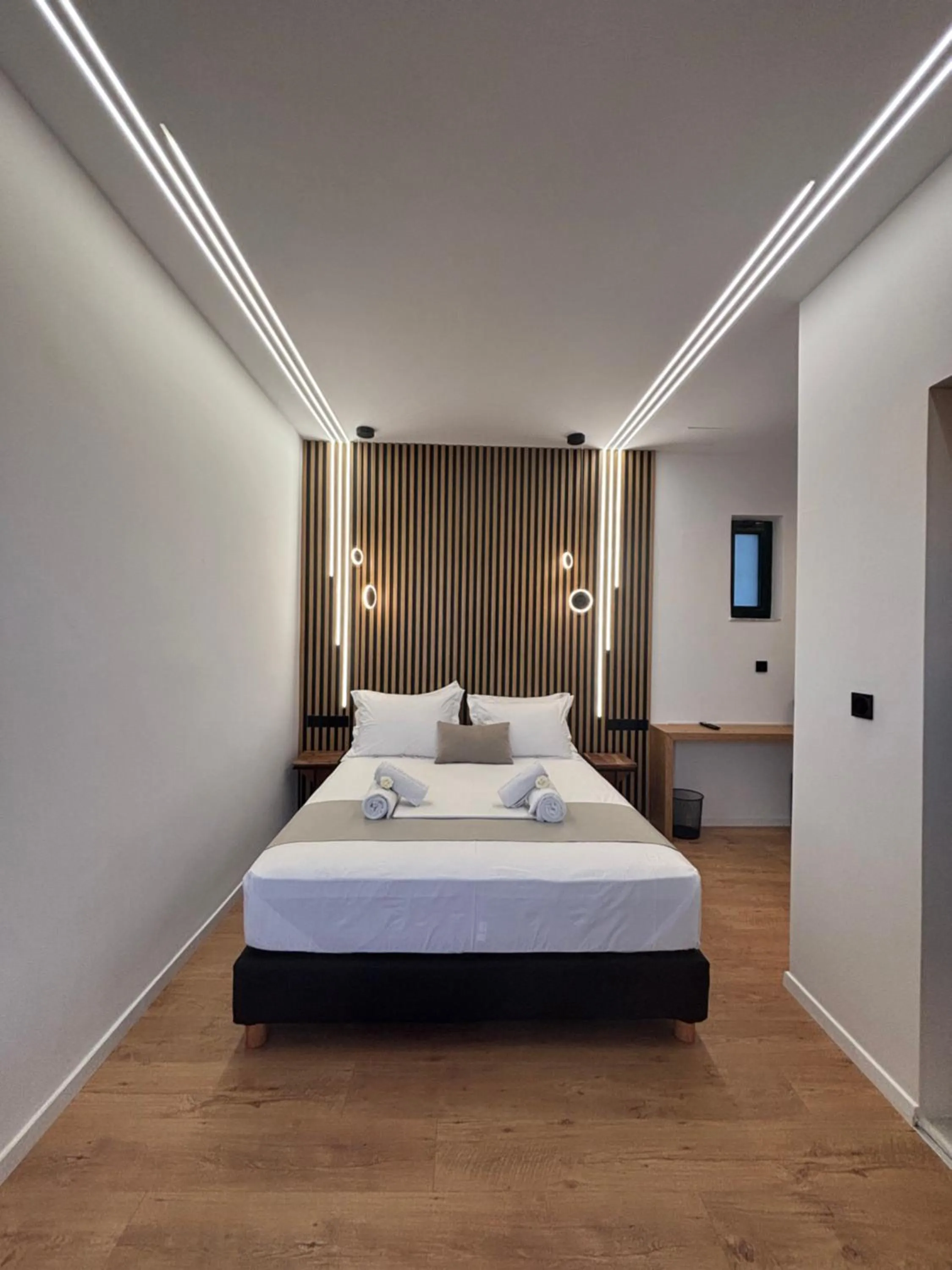 Bed in Ampoulos Rooms & Apartments