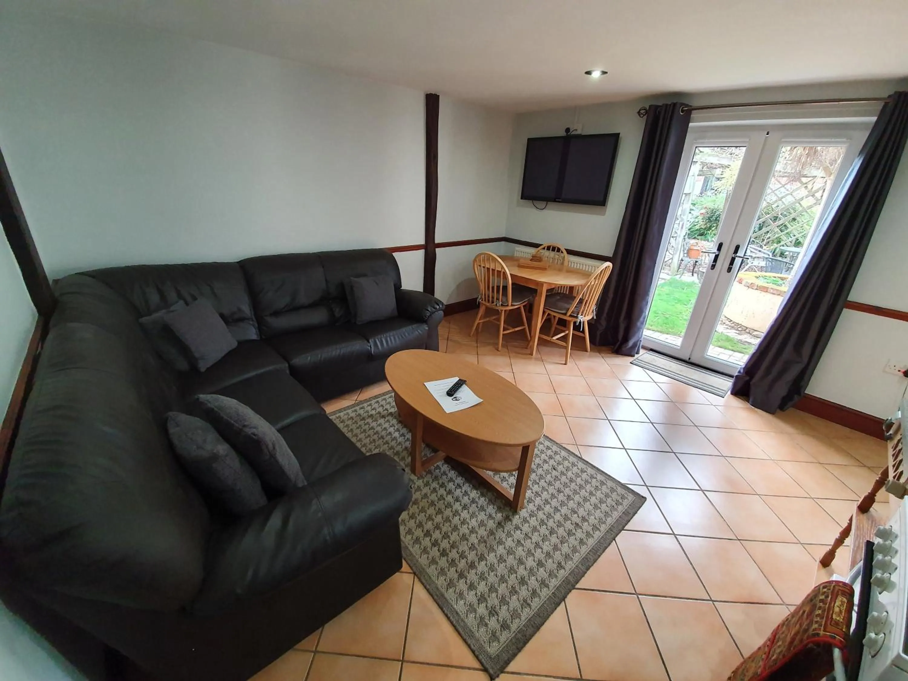 Communal lounge/ TV room in Low Farm Cottages