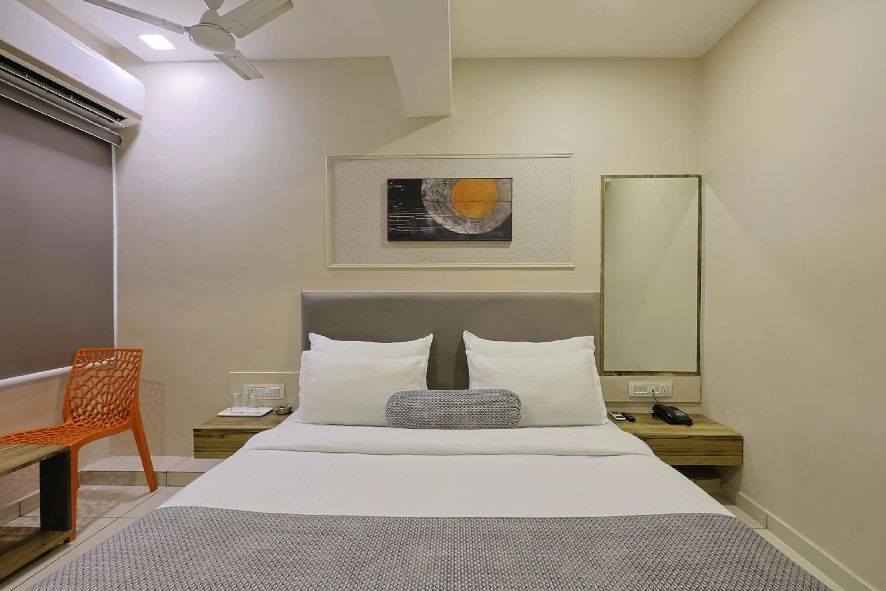 Bed in HOTEL SHALIGRAM