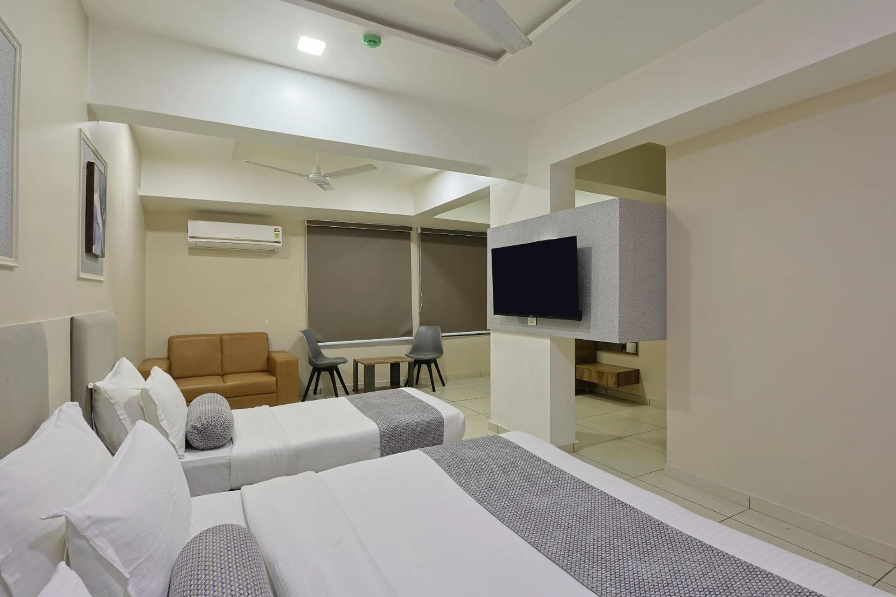 Bed in HOTEL SHALIGRAM