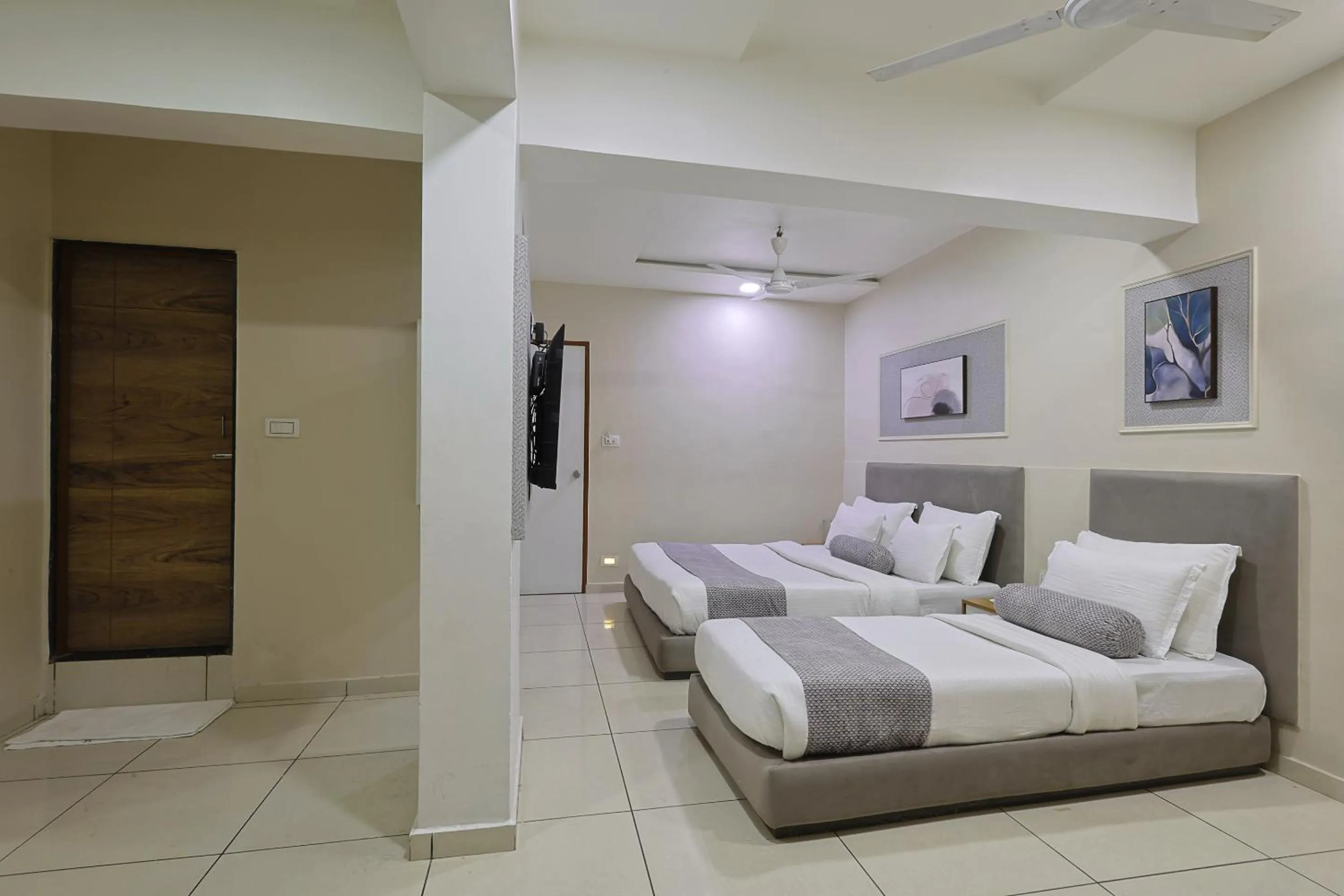 Bed in HOTEL SHALIGRAM