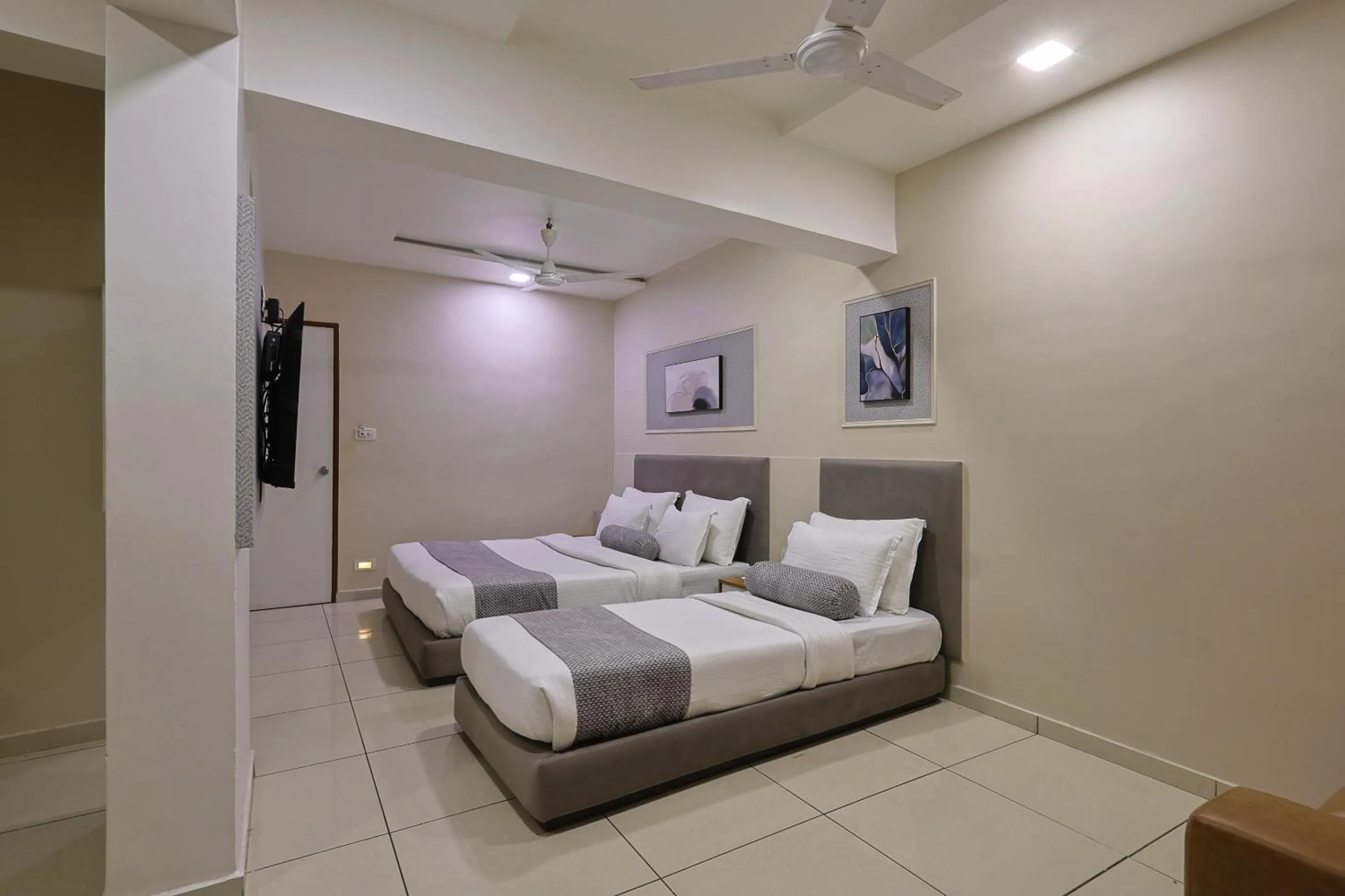 Bed in HOTEL SHALIGRAM