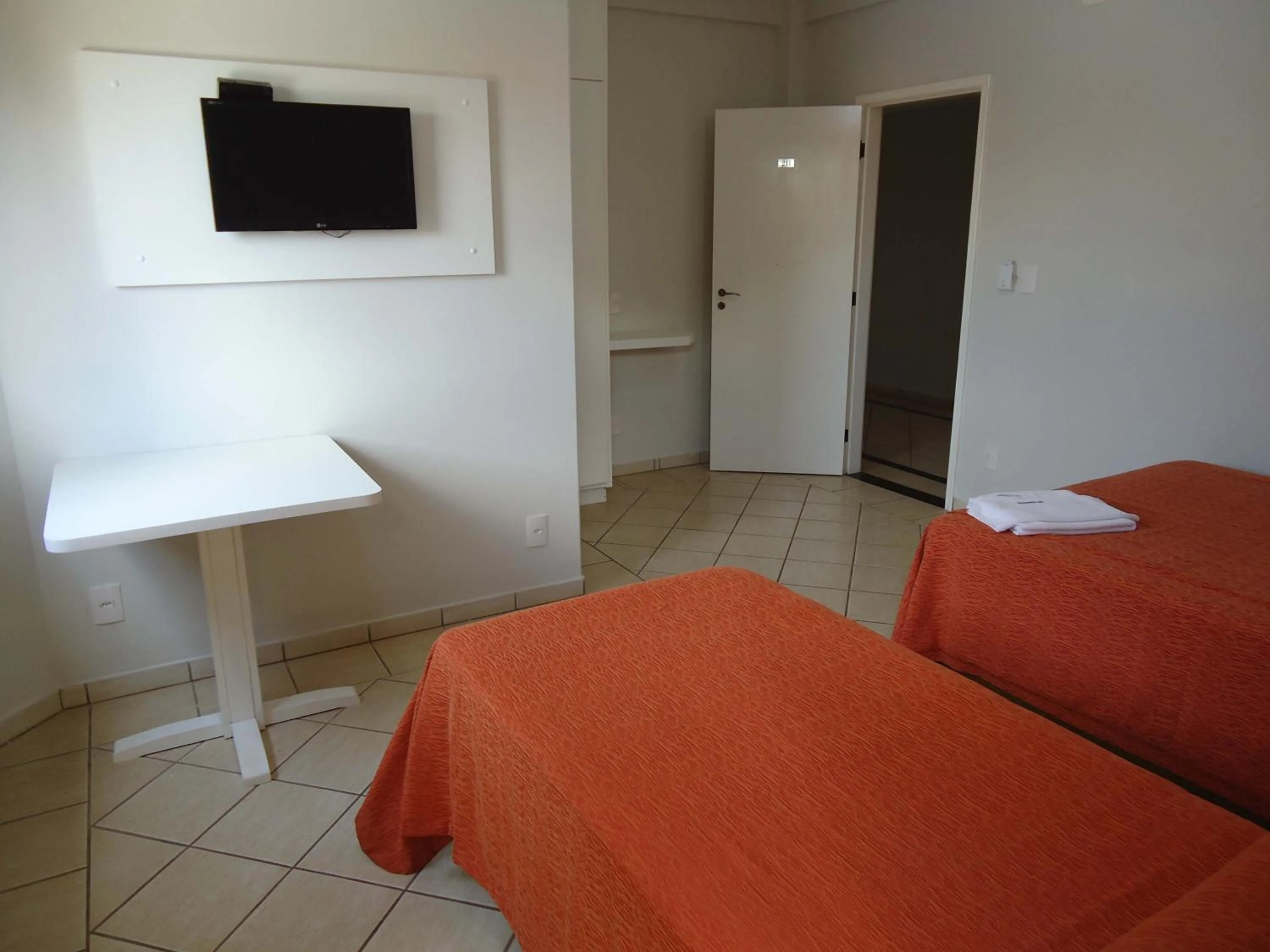 Bed in Big Executive Hotel